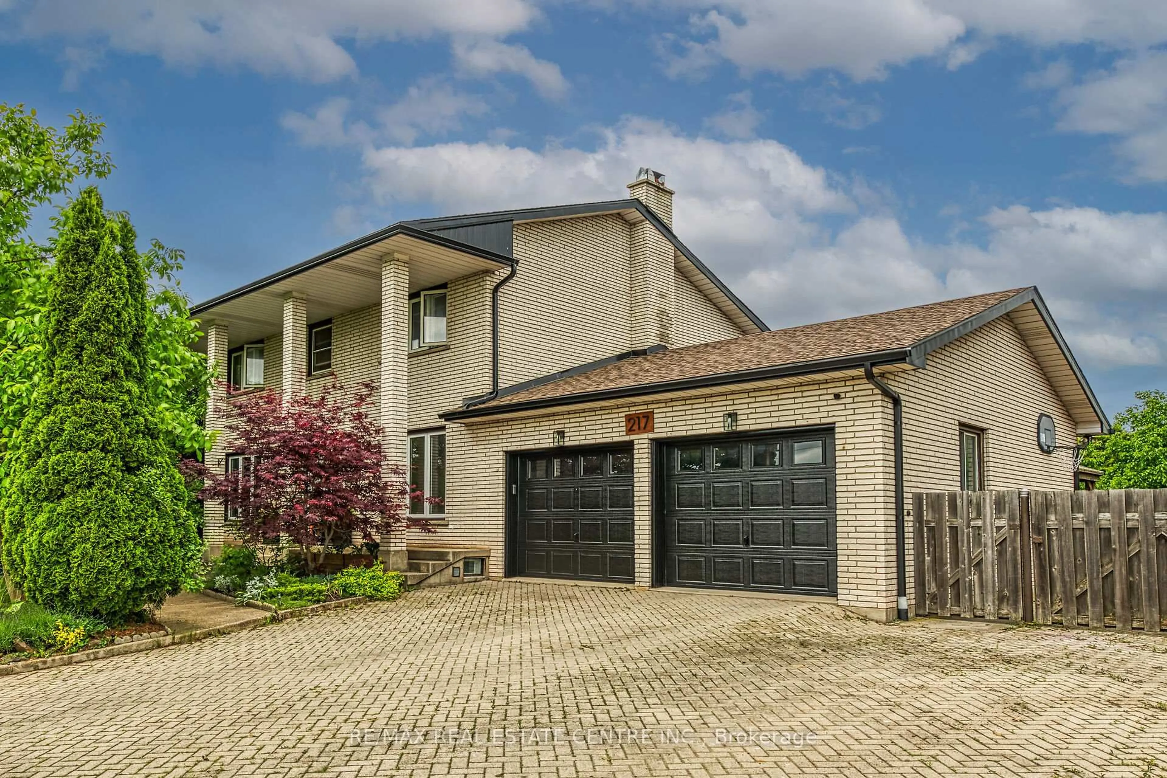 Home with brick exterior material, street for 217 Jones Rd, Hamilton Ontario L8E 5J4