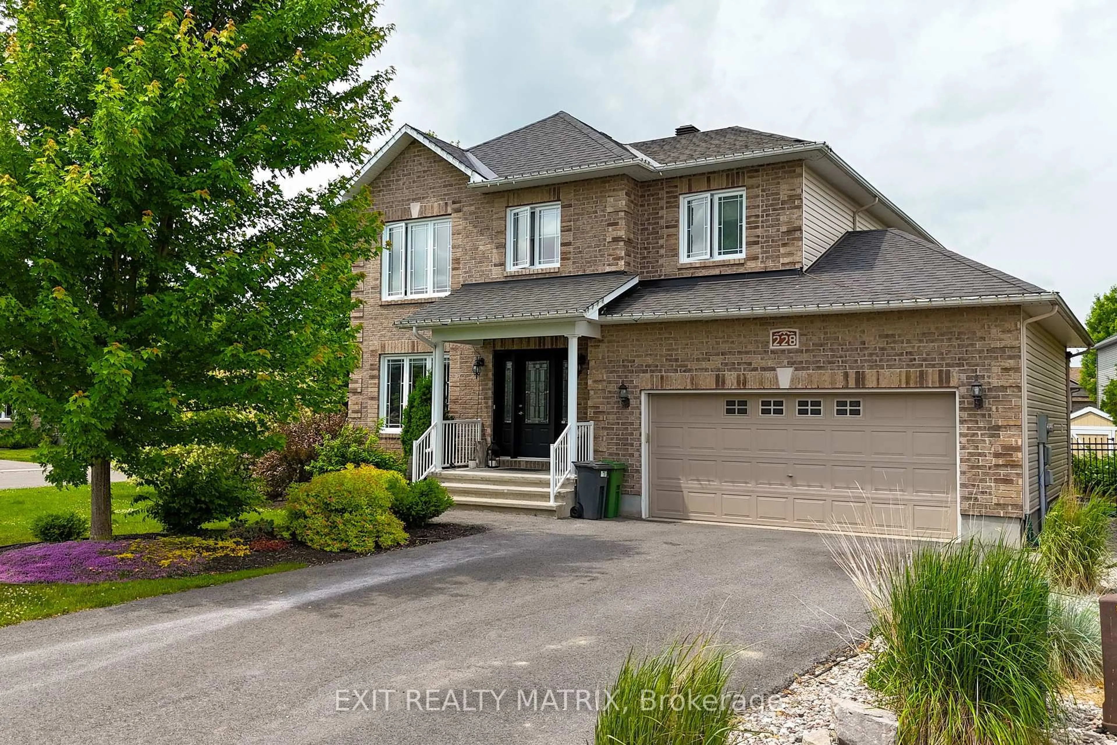 Home with brick exterior material, street for 228 Olde Towne Ave, Russell Ontario K4R 0B3