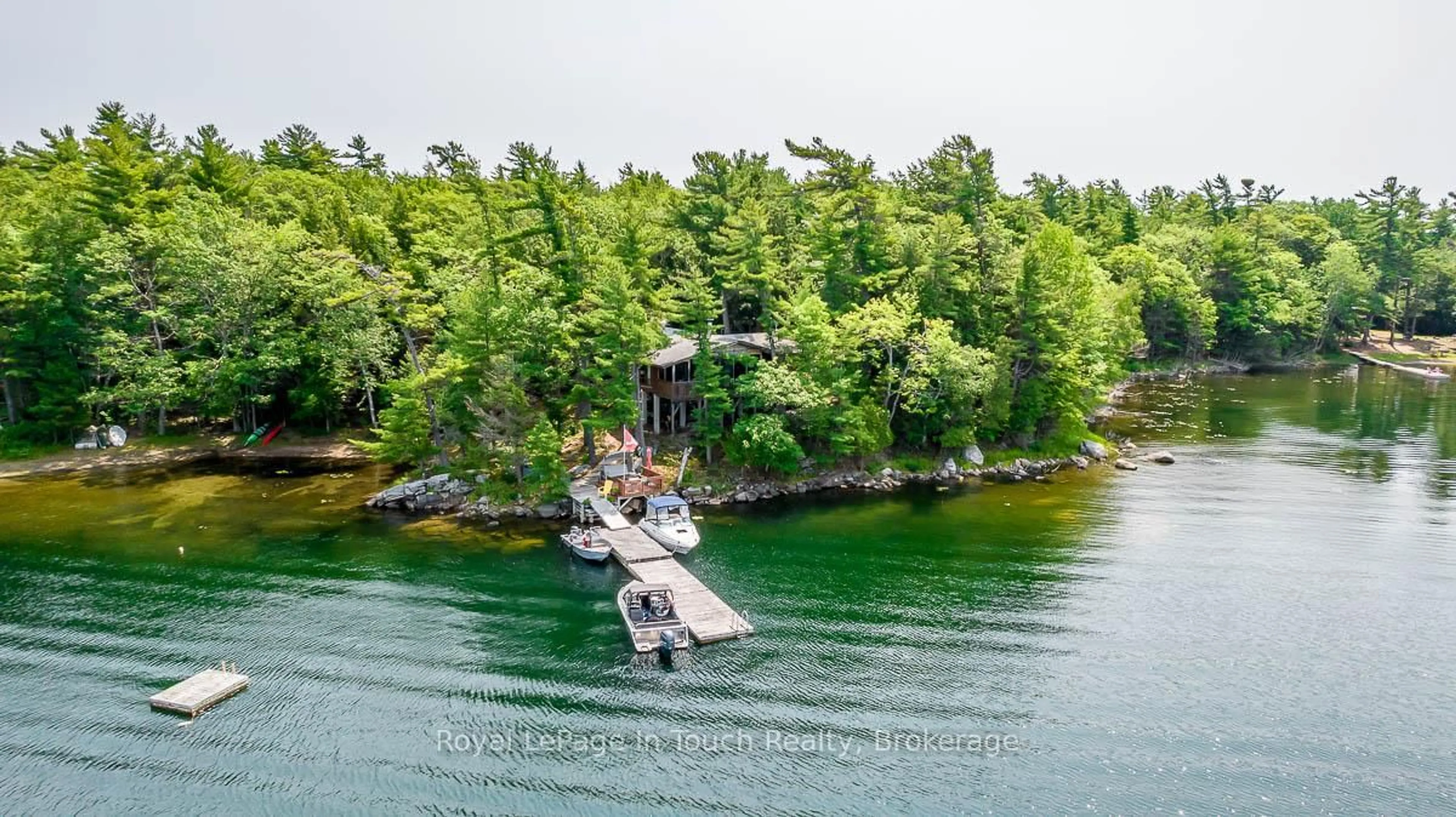 A pic from outside/outdoor area/front of a property/back of a property/a pic from drone, water/lake/river/ocean view for B207-7 WAHSOUNE Island, The Archipelago Ontario P2A 1T4