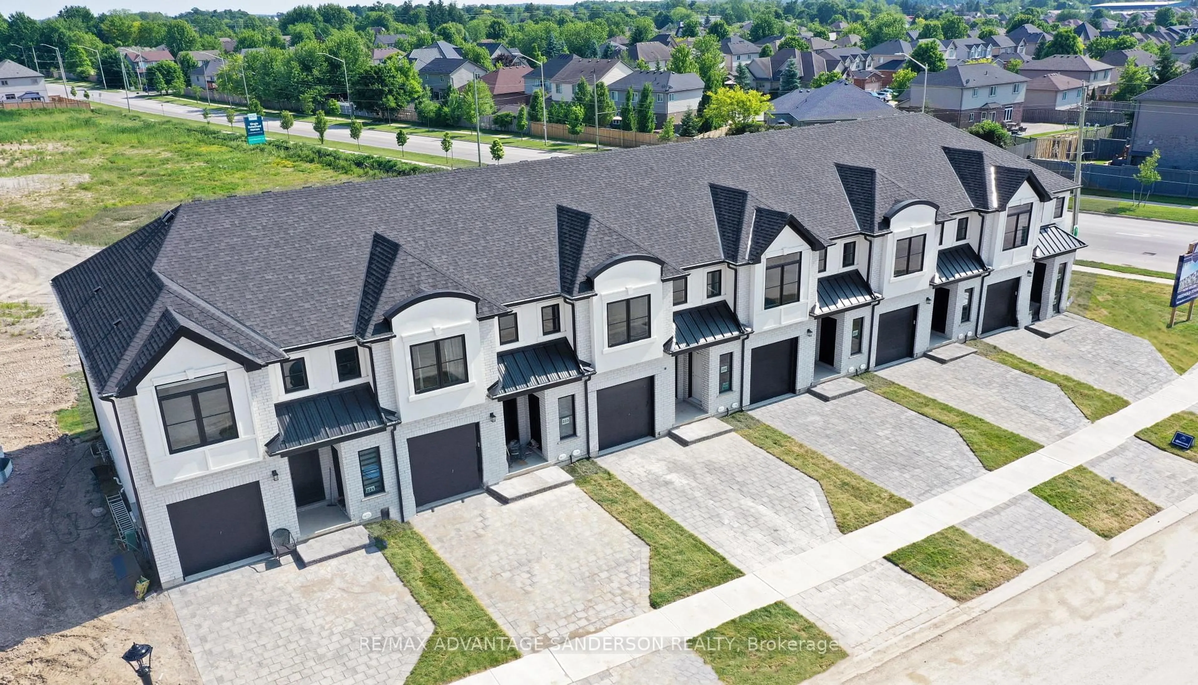 A pic from outside/outdoor area/front of a property/back of a property/a pic from drone, street for 195 Bowman Dr, Middlesex Centre Ontario N0M 2A0