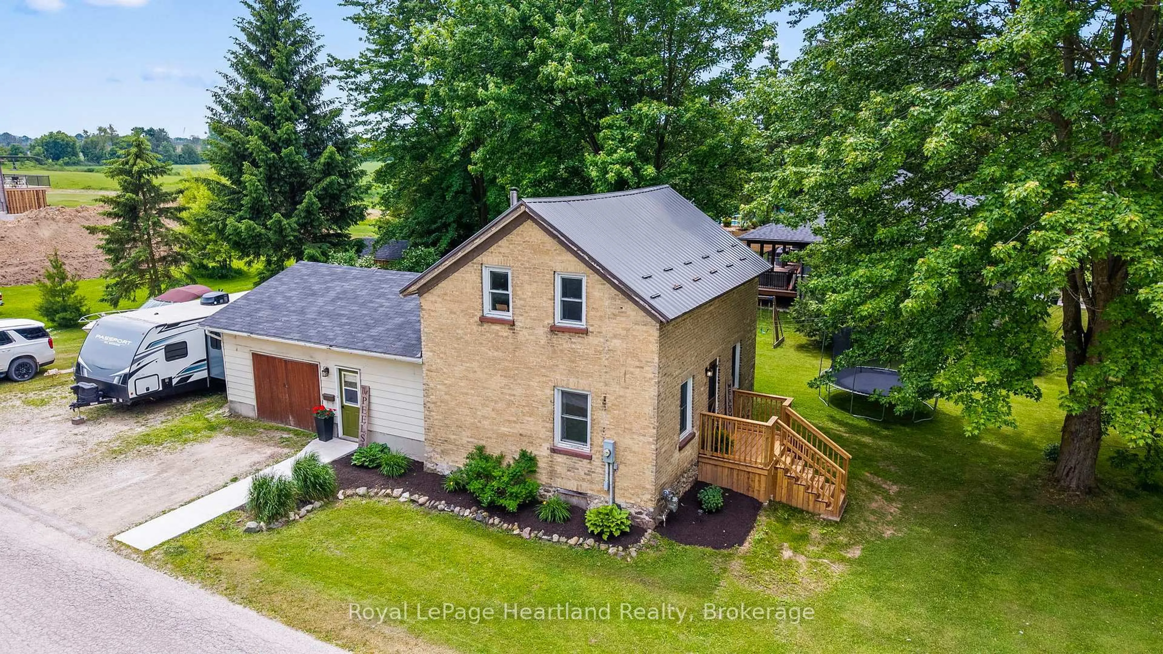 A pic from outside/outdoor area/front of a property/back of a property/a pic from drone, street for 33 ALLAN St, Minto Ontario N0G 1M0