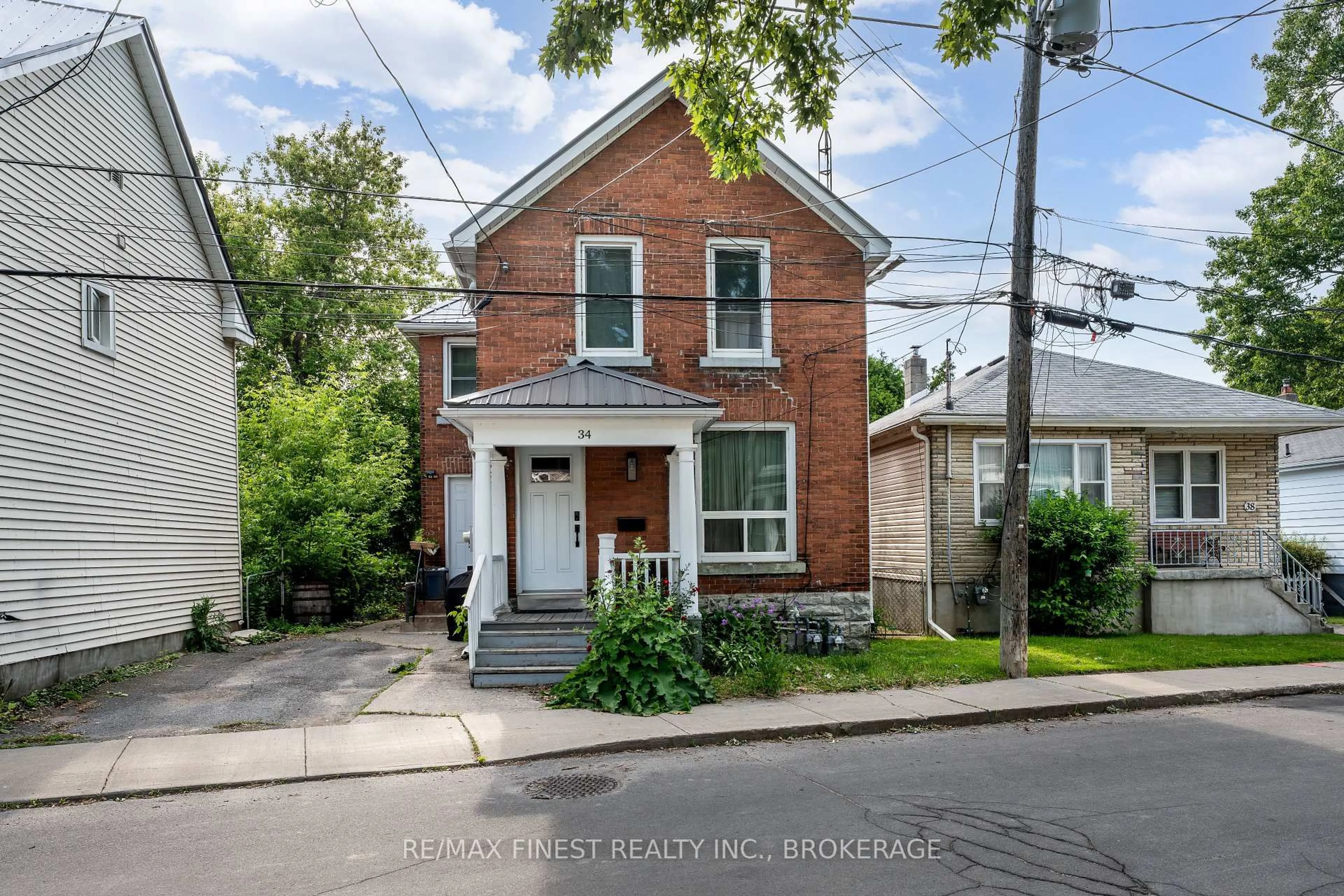 Home with brick exterior material, street for 34 Main St, Kingston Ontario K7K 3Y4