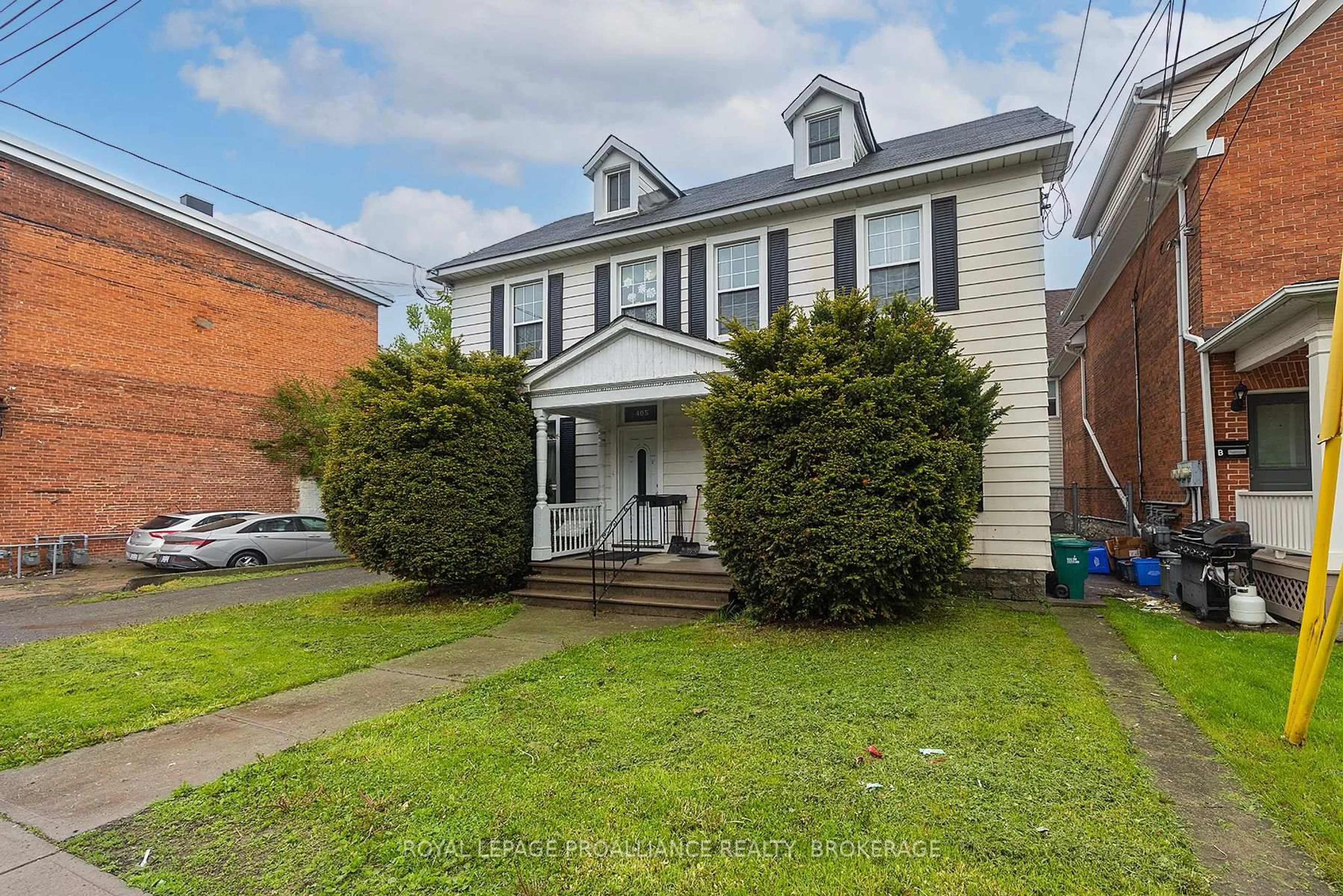 Home with brick exterior material, street for 403-405 Johnson St, Kingston Ontario K7L 1Z1