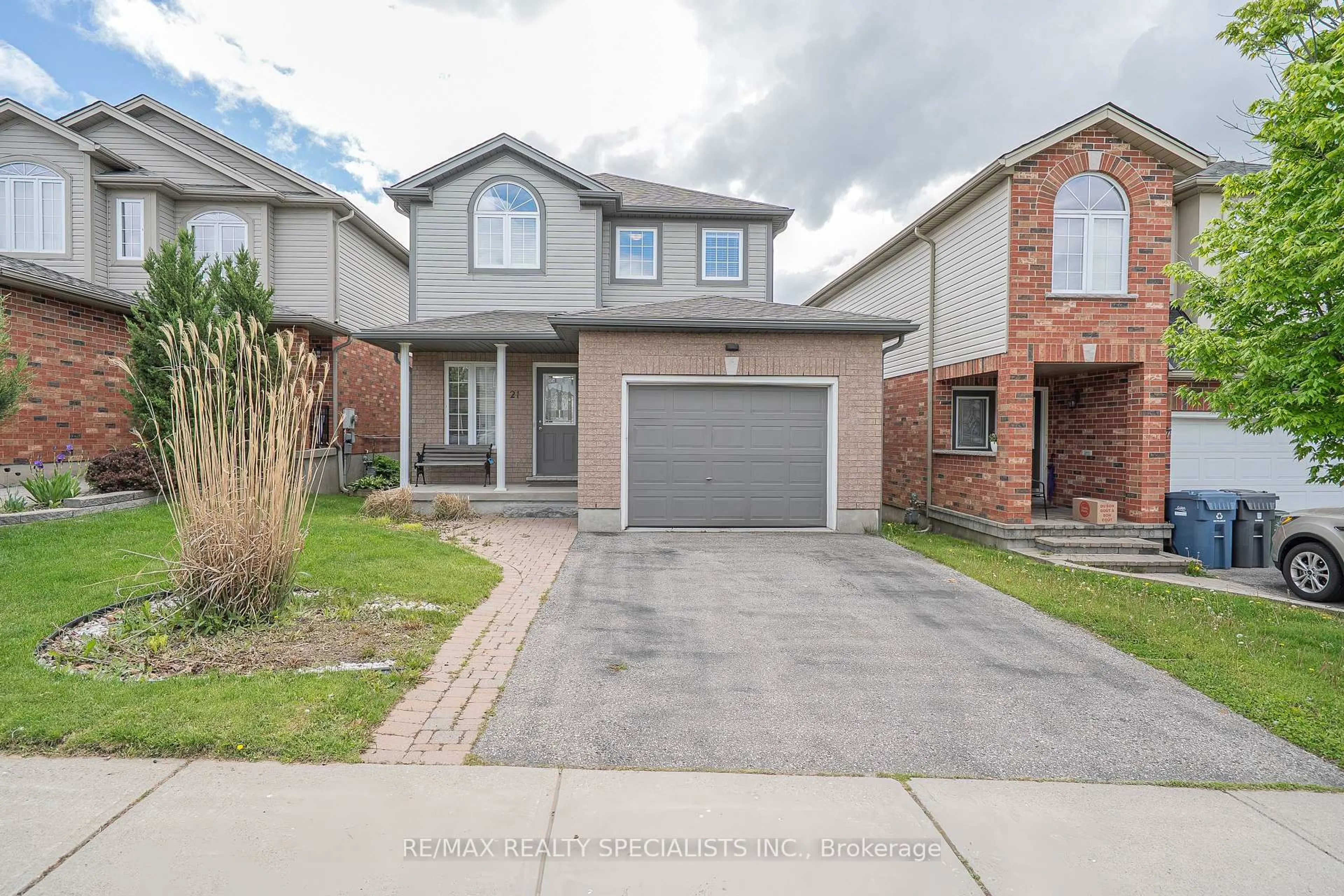 Home with brick exterior material, street for 21 Henderson Dr, Guelph Ontario N1E 0A1