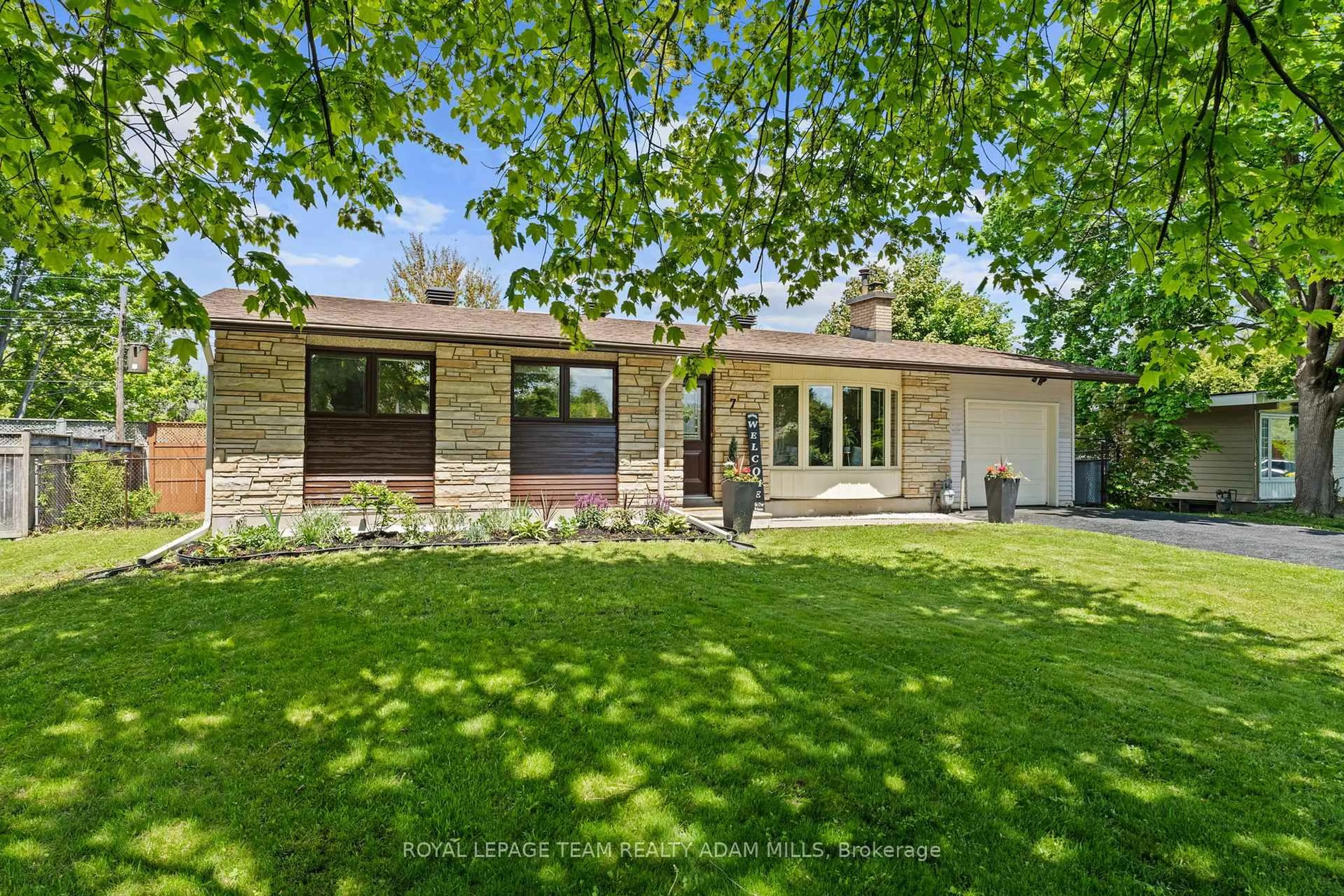 Home with brick exterior material, street for 7 Elterwater Ave, Ottawa Ontario K2H 5J1