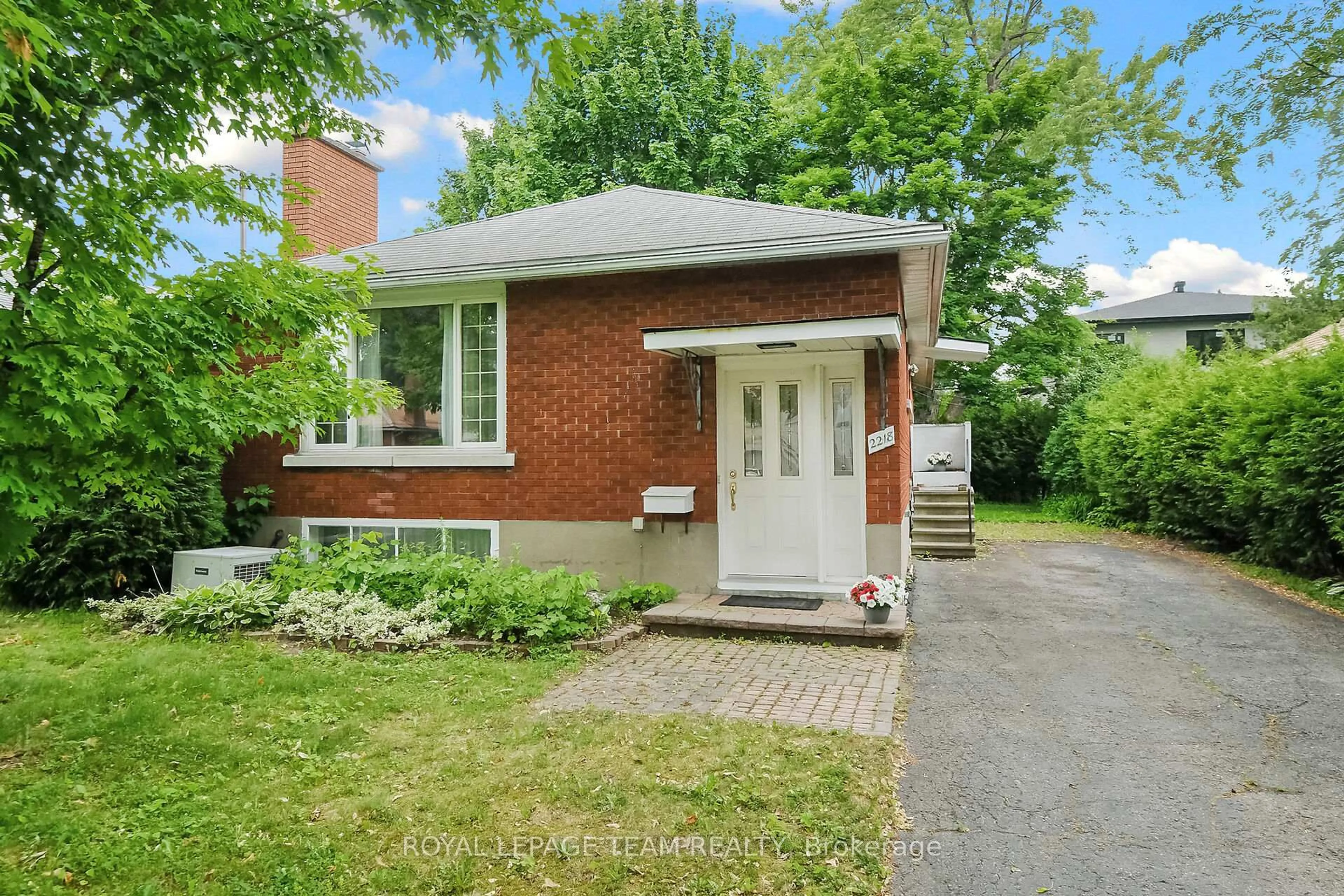 Home with brick exterior material, street for 2218 Prospect Ave, Ottawa Ontario K1H 7G3