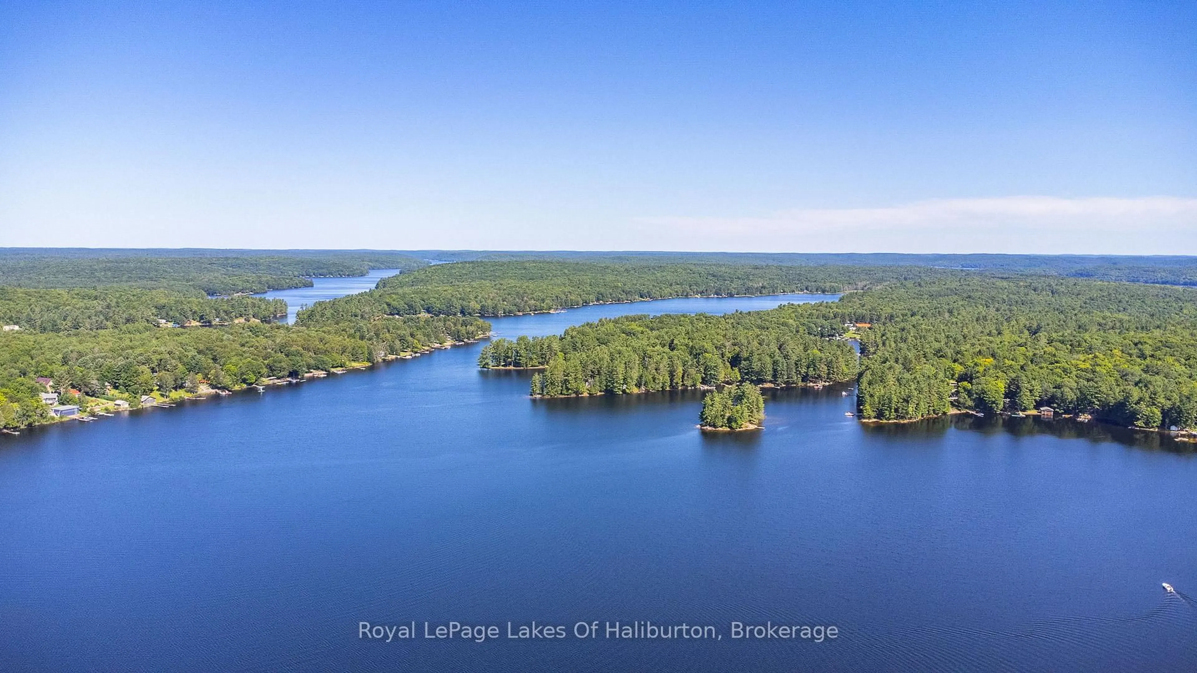 A pic from outside/outdoor area/front of a property/back of a property/a pic from drone, water/lake/river/ocean view for 1358 Kushog Lake Rd, Algonquin Highlands Ontario K0M 1S0