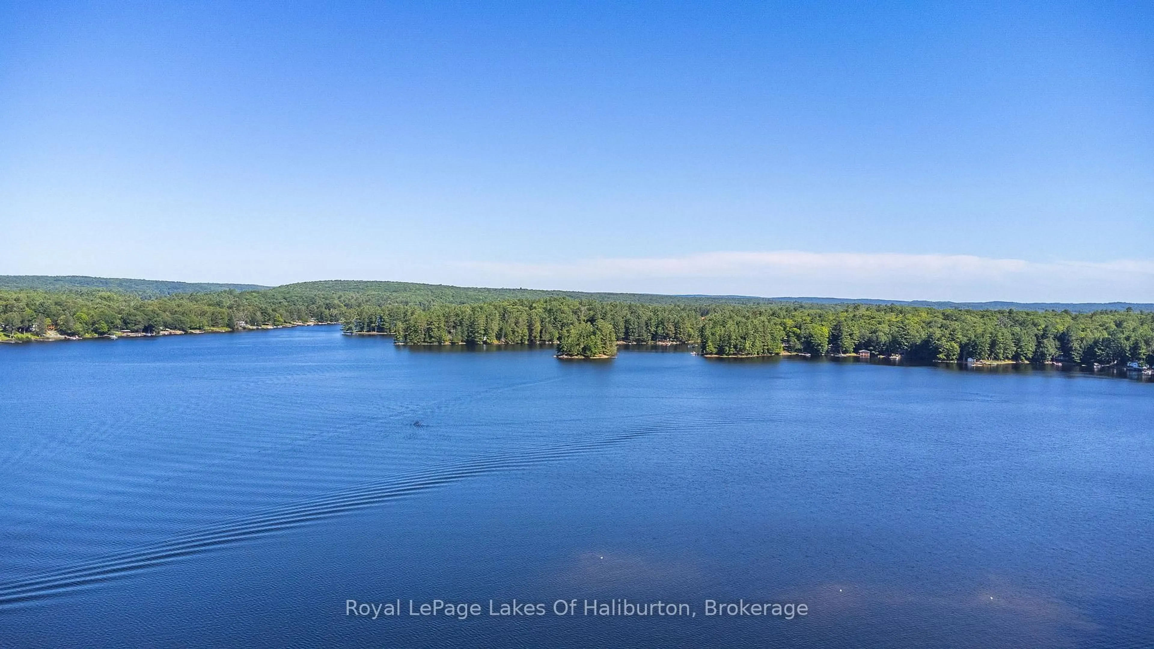 A pic from outside/outdoor area/front of a property/back of a property/a pic from drone, water/lake/river/ocean view for 1358 Kushog Lake Rd, Algonquin Highlands Ontario K0M 1S0