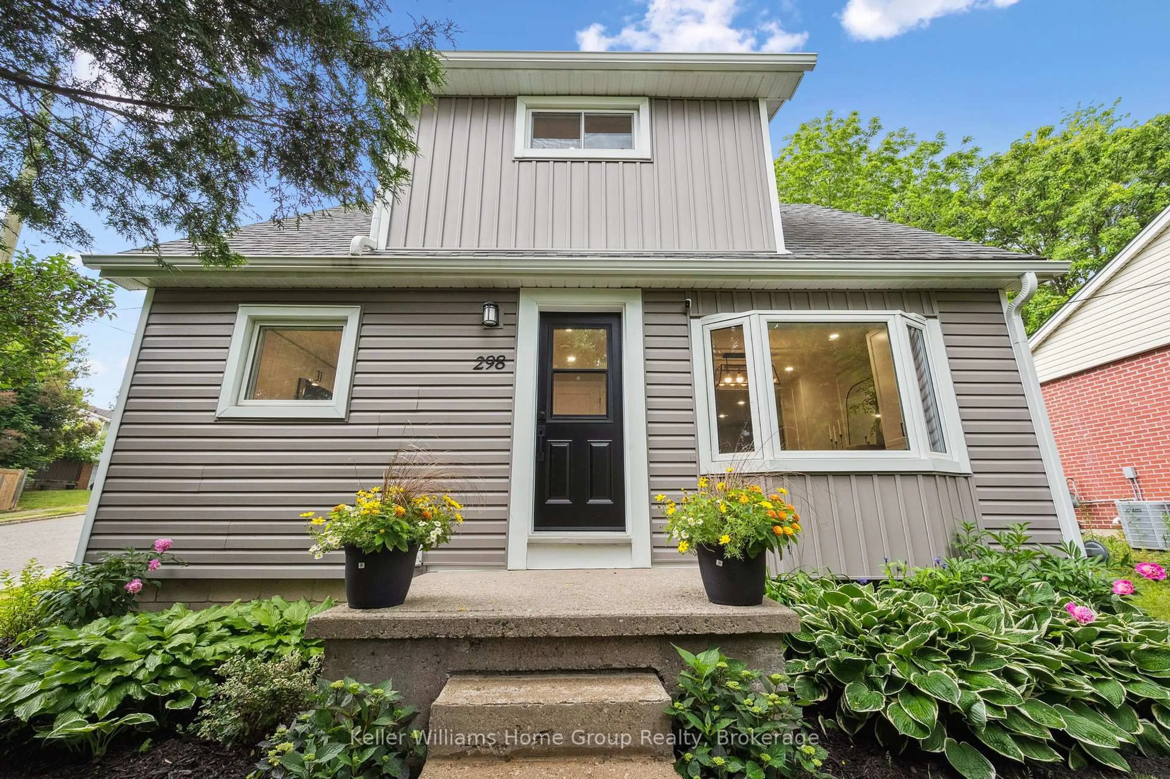 Home with vinyl exterior material, street for 298 Kathleen St, Guelph Ontario N1H 4Y8