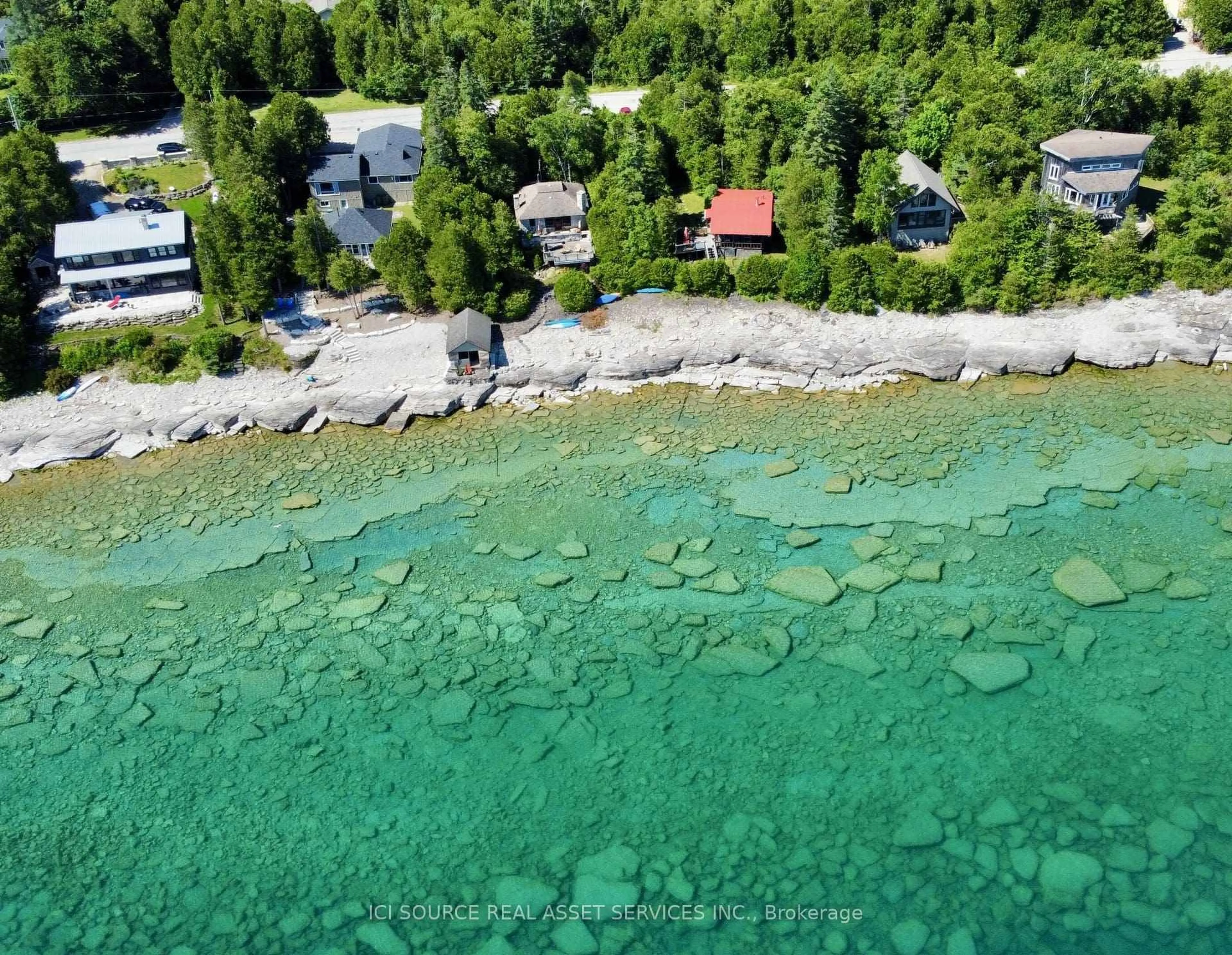 A pic from outside/outdoor area/front of a property/back of a property/a pic from drone, water/lake/river/ocean view for 60 Isthmus Bay Rd, Northern Bruce Peninsula Ontario N0H 1W0