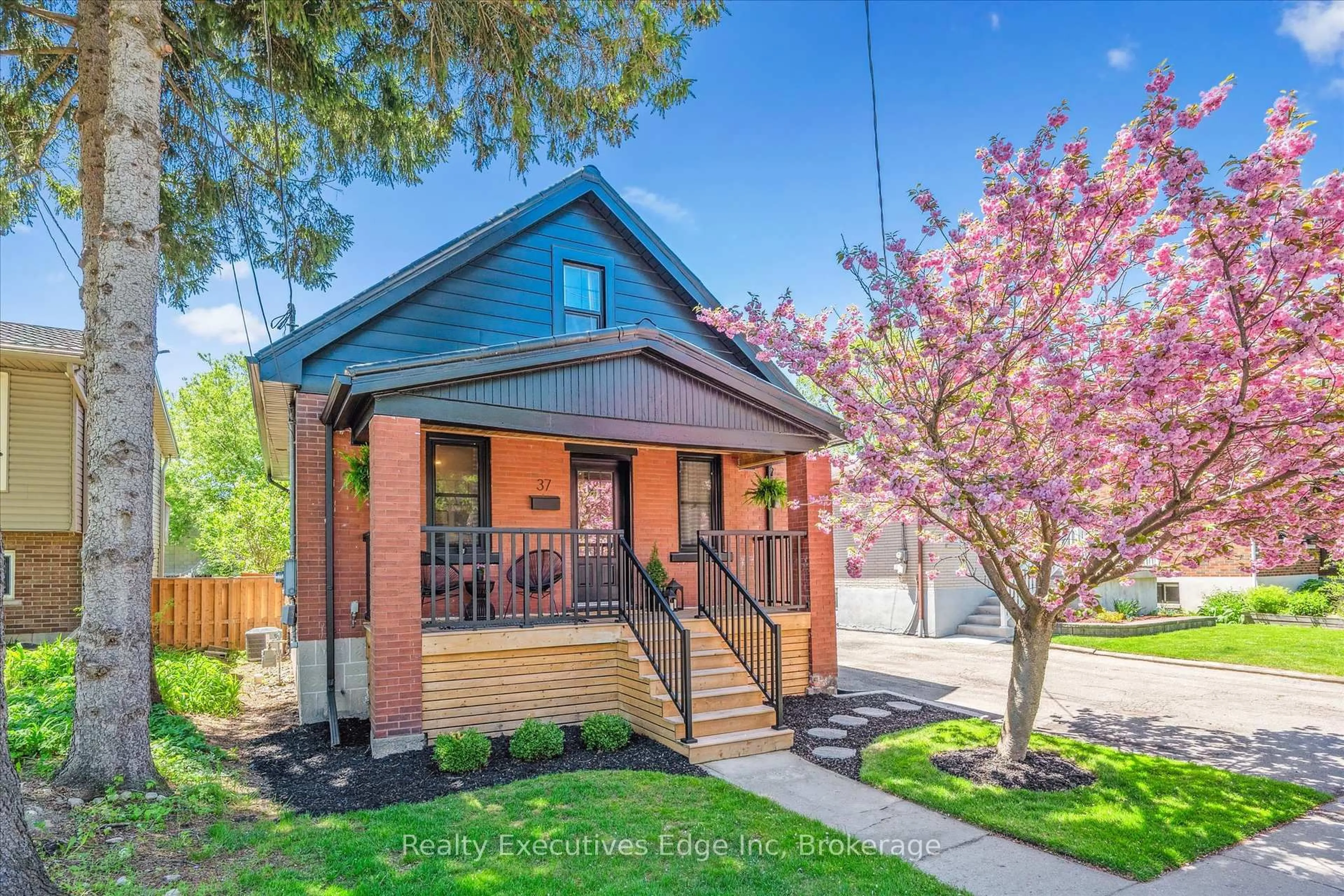 Home with brick exterior material, street for 37 HURON St, Guelph Ontario N1E 5L3