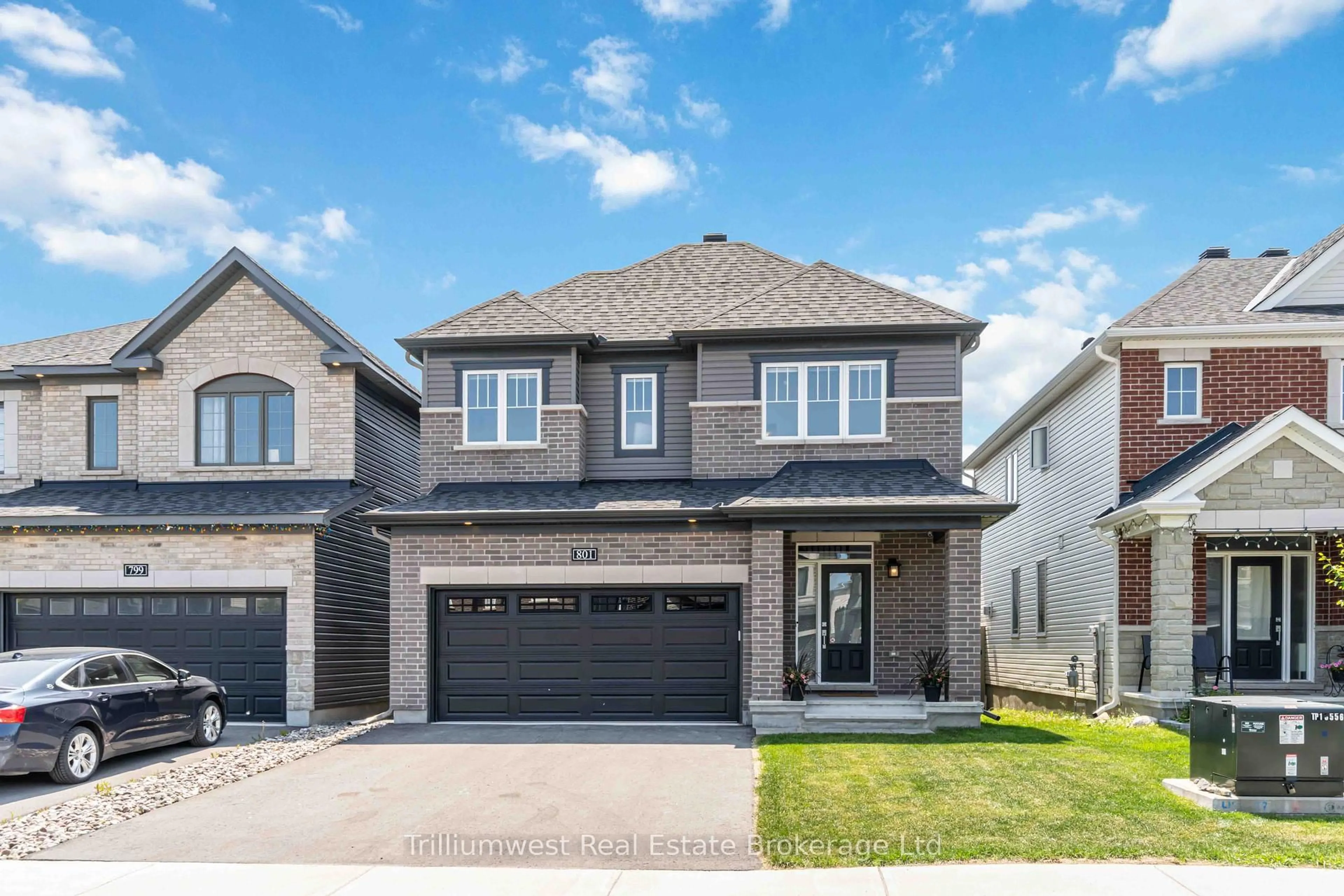 Home with brick exterior material, street for 801 Cappamore Dr, Ottawa Ontario K2J 6V6
