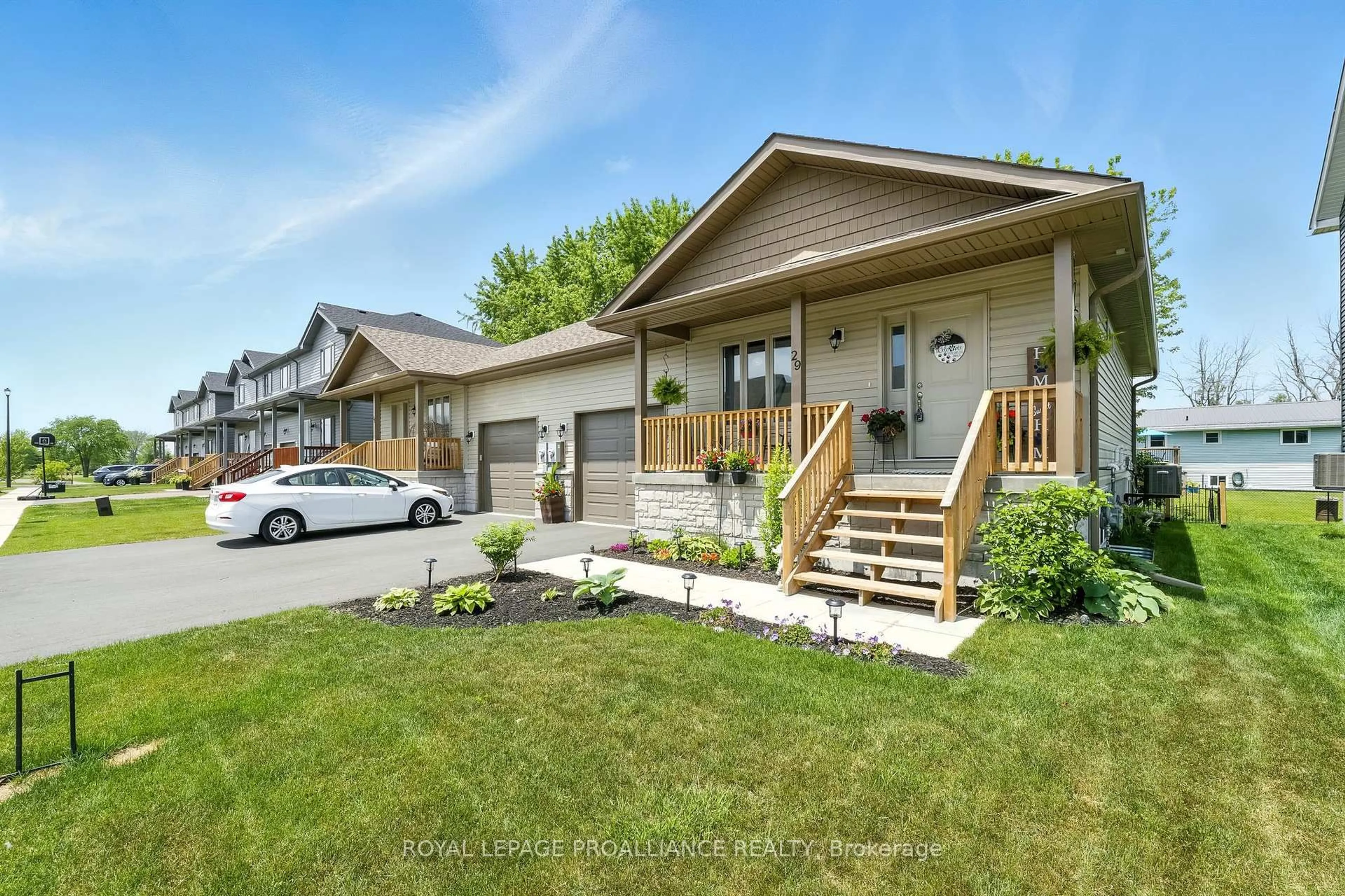 Home with vinyl exterior material, street for 29 Rabbit Rd, Brighton Ontario K0K 1H0