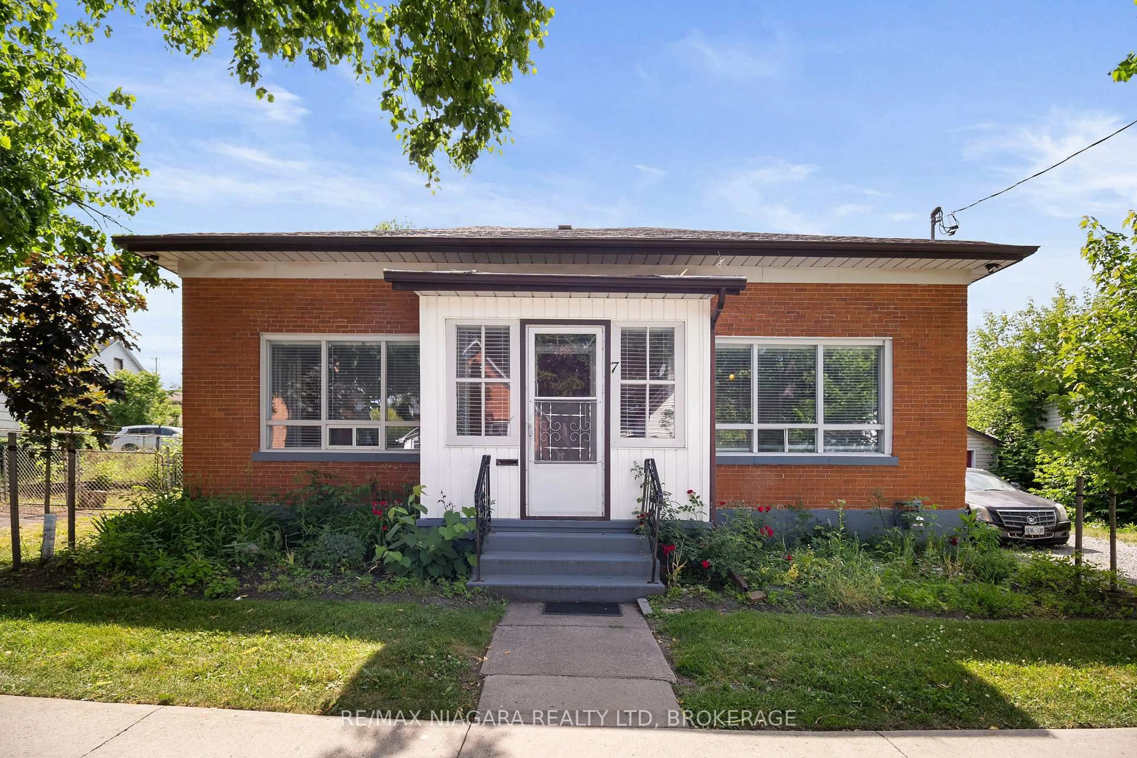 Home with brick exterior material, street for 7 TASKER St, St. Catharines Ontario L2R 3Z7