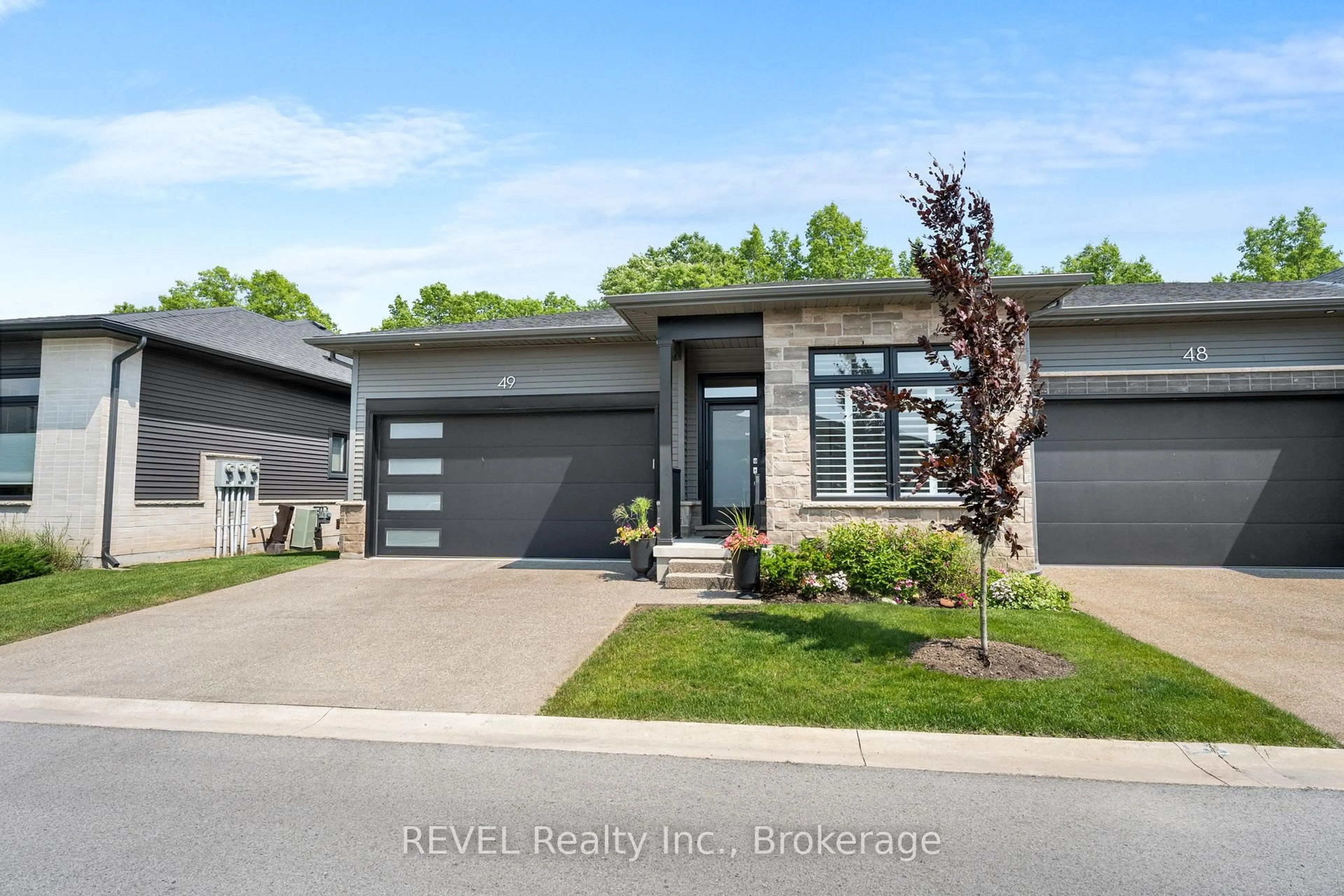 Home with brick exterior material, street for 8974 Willoughby Dr #49, Niagara Falls Ontario L2G 0Y8