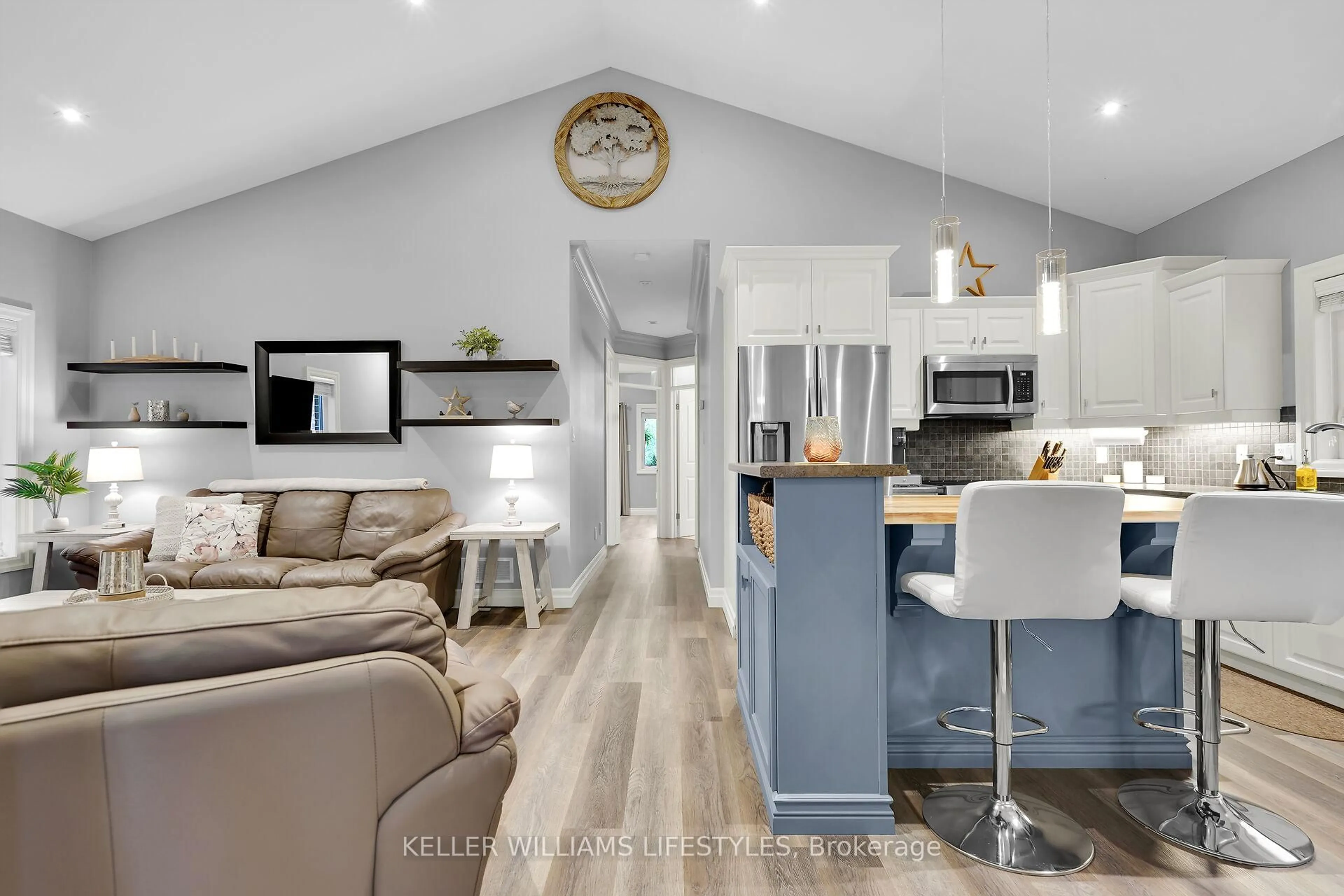 Open concept kitchen, wood/laminate floor for 1838 Cherrywood Tr, London North Ontario N6H 0E2