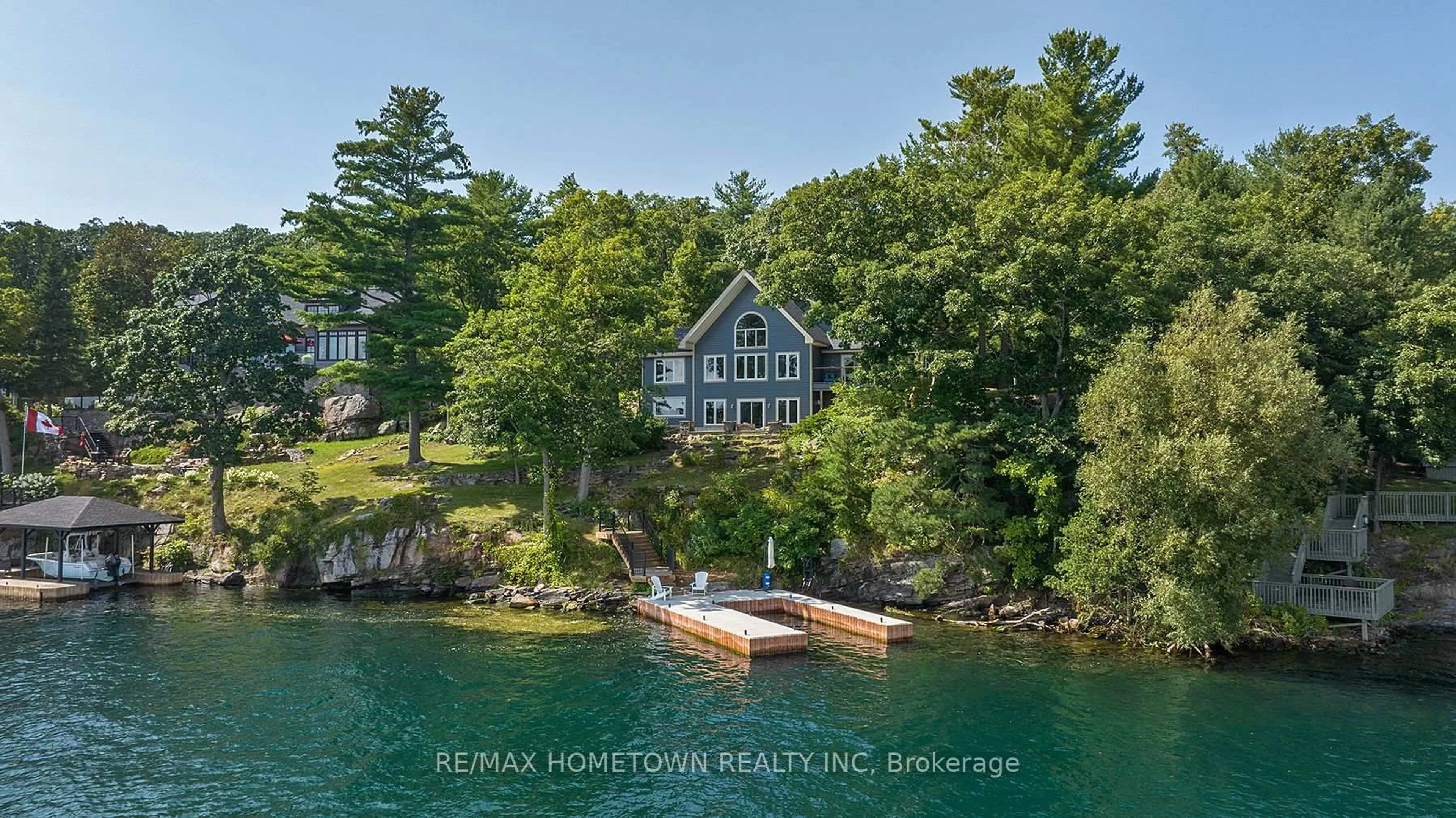 A pic from outside/outdoor area/front of a property/back of a property/a pic from drone, water/lake/river/ocean view for 41 RIVERVIEW Dr, Leeds and the Thousand Islands Ontario K0E 1V0