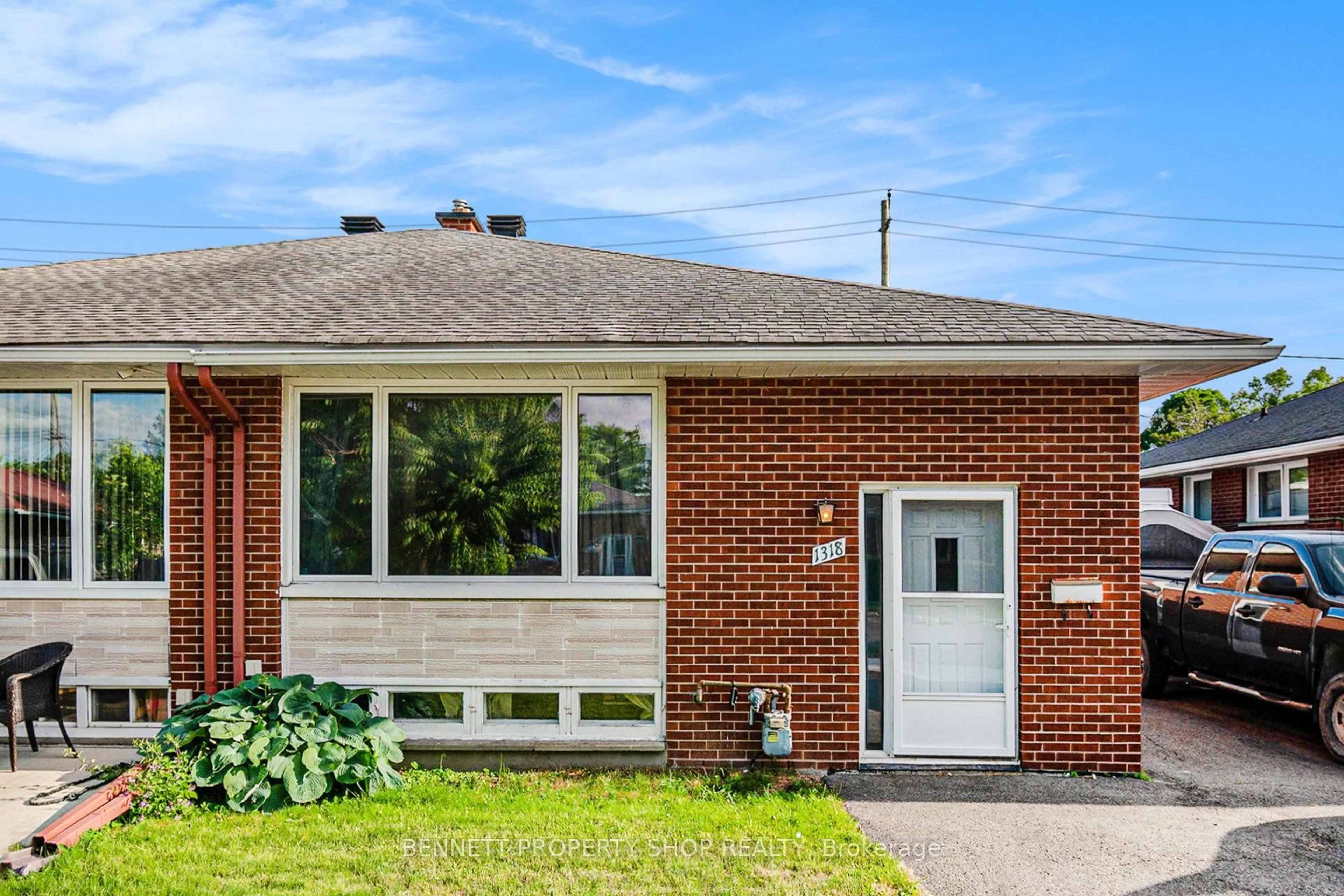 Home with brick exterior material, street for 1318 Highgate Rd, Ottawa Ontario K2C 2Y6
