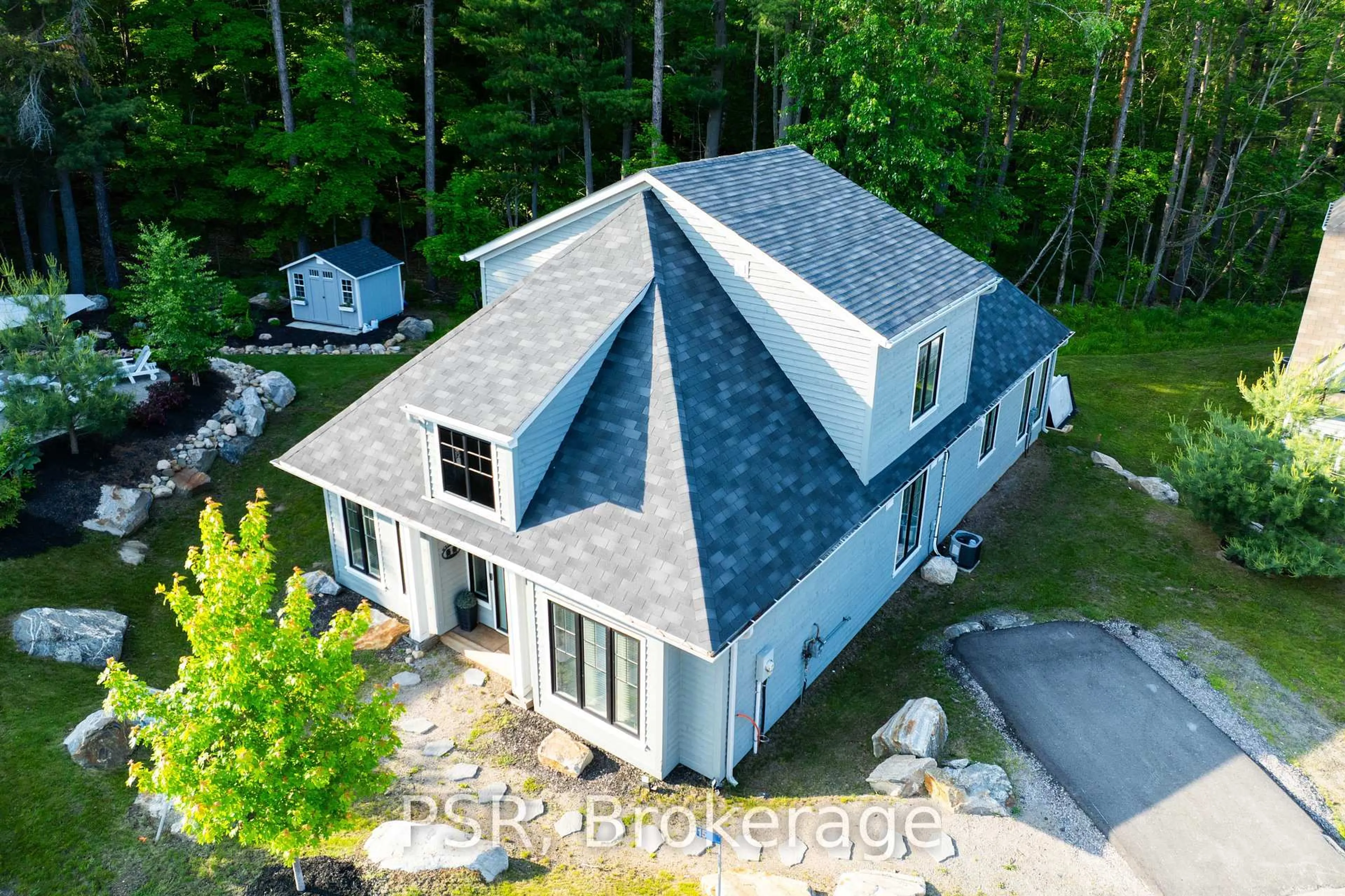 A pic from outside/outdoor area/front of a property/back of a property/a pic from drone, building for 2054 Peninsula Rd #15, Muskoka Lakes Ontario P0B 1G0