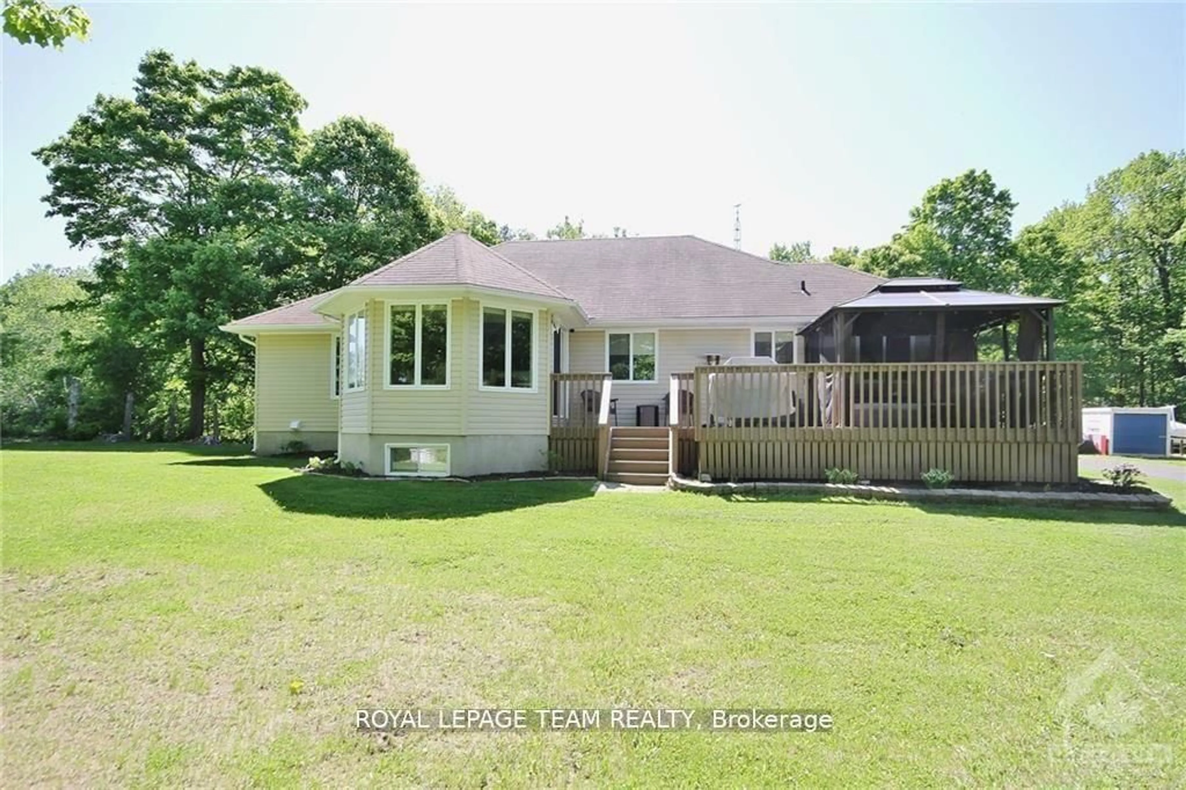 A pic from outside/outdoor area/front of a property/back of a property/a pic from drone, water/lake/river/ocean view for 988 River Rd, North Grenville Ontario K0G 1J0