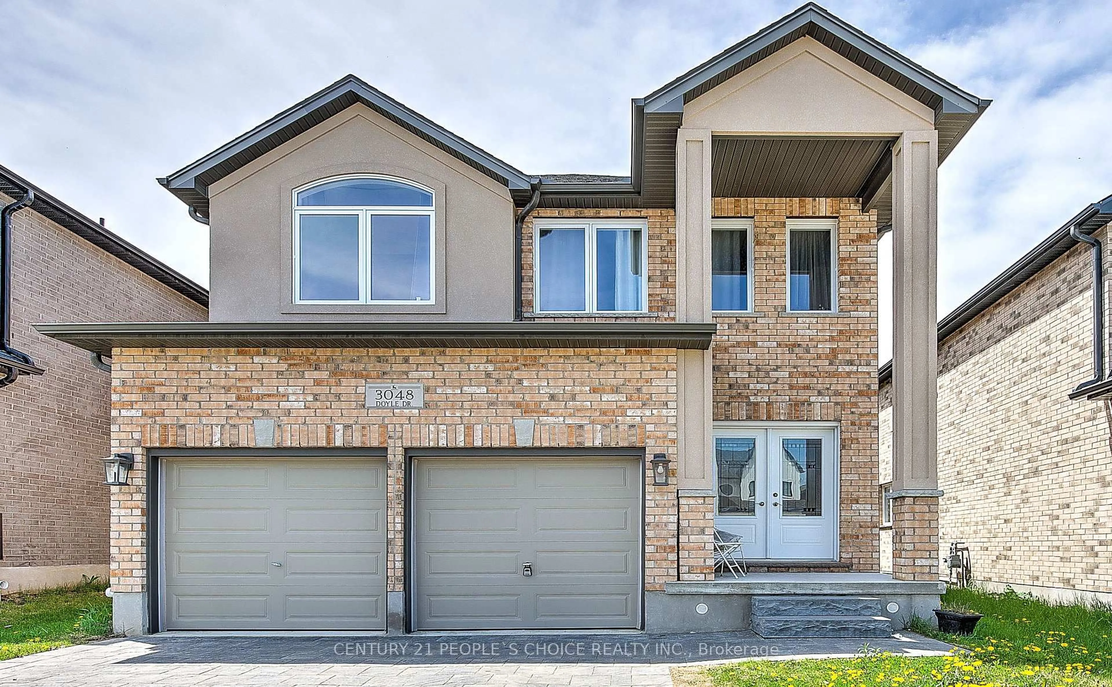 Home with brick exterior material, street for 3048 Doyle Dr, London South Ontario N6M 0G9