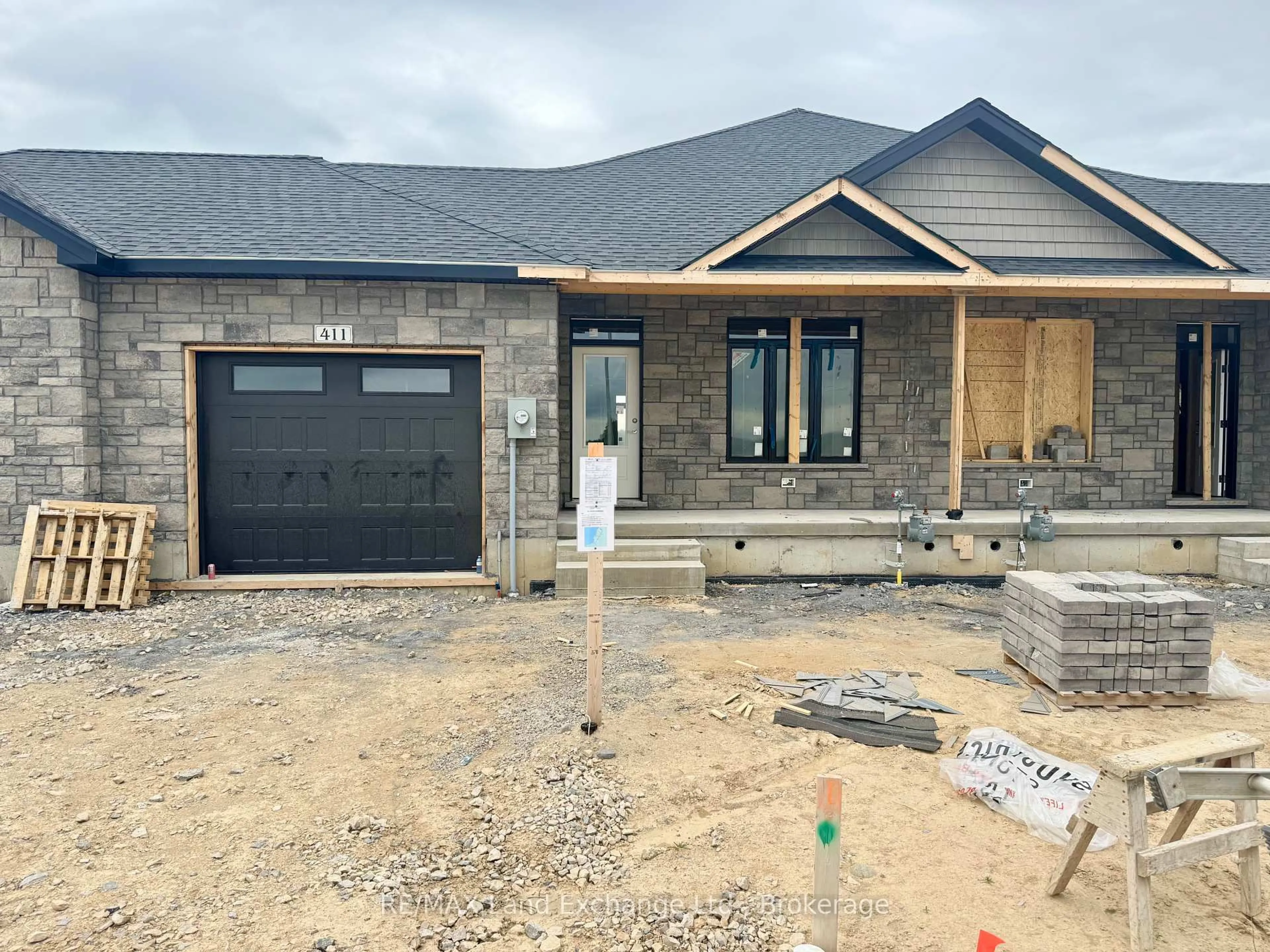 Home with brick exterior material, street for 411 Ivings Dr, Saugeen Shores Ontario N0H 2C1