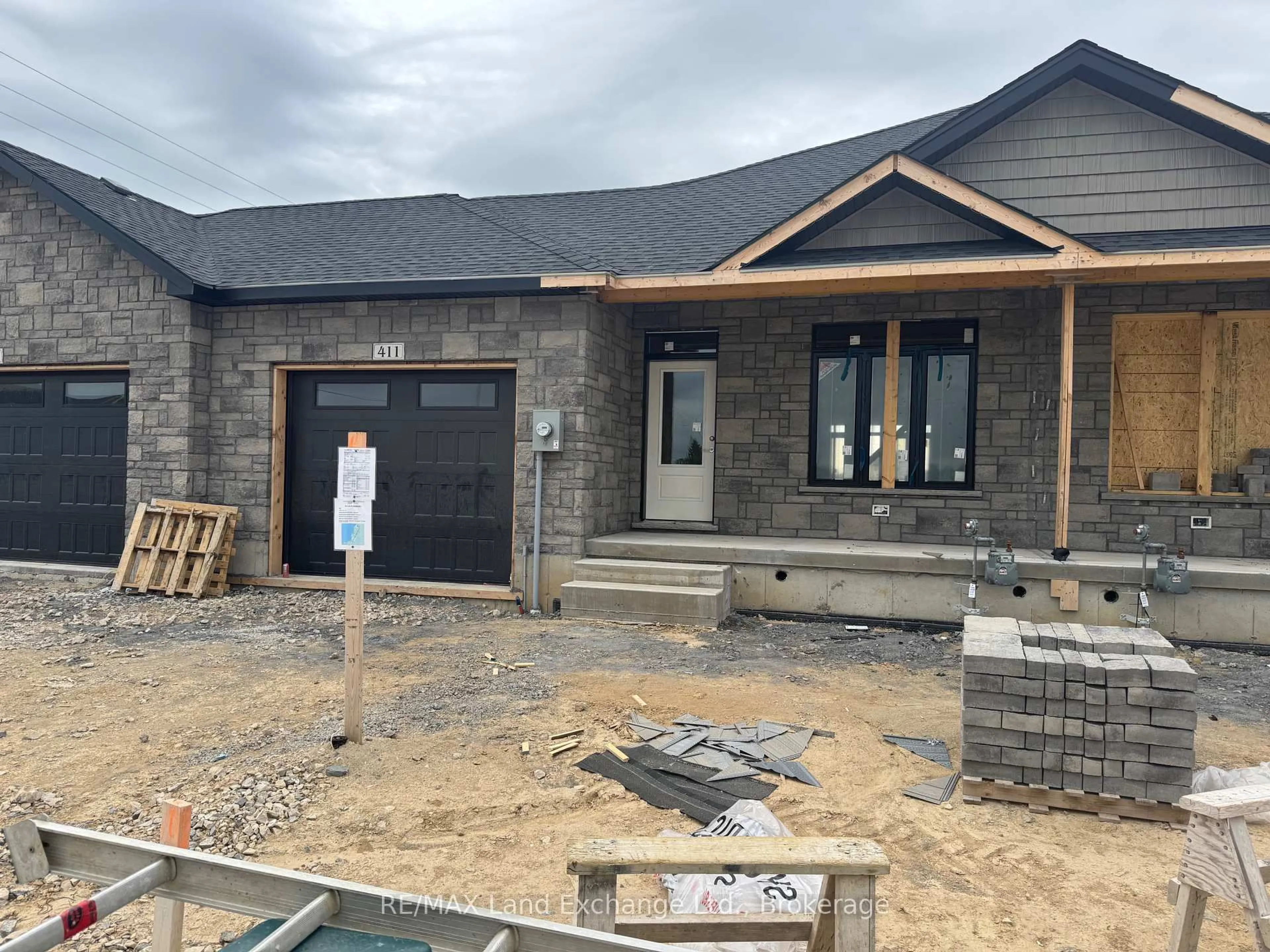 Home with brick exterior material, building for 411 Ivings Dr, Saugeen Shores Ontario N0H 2C1