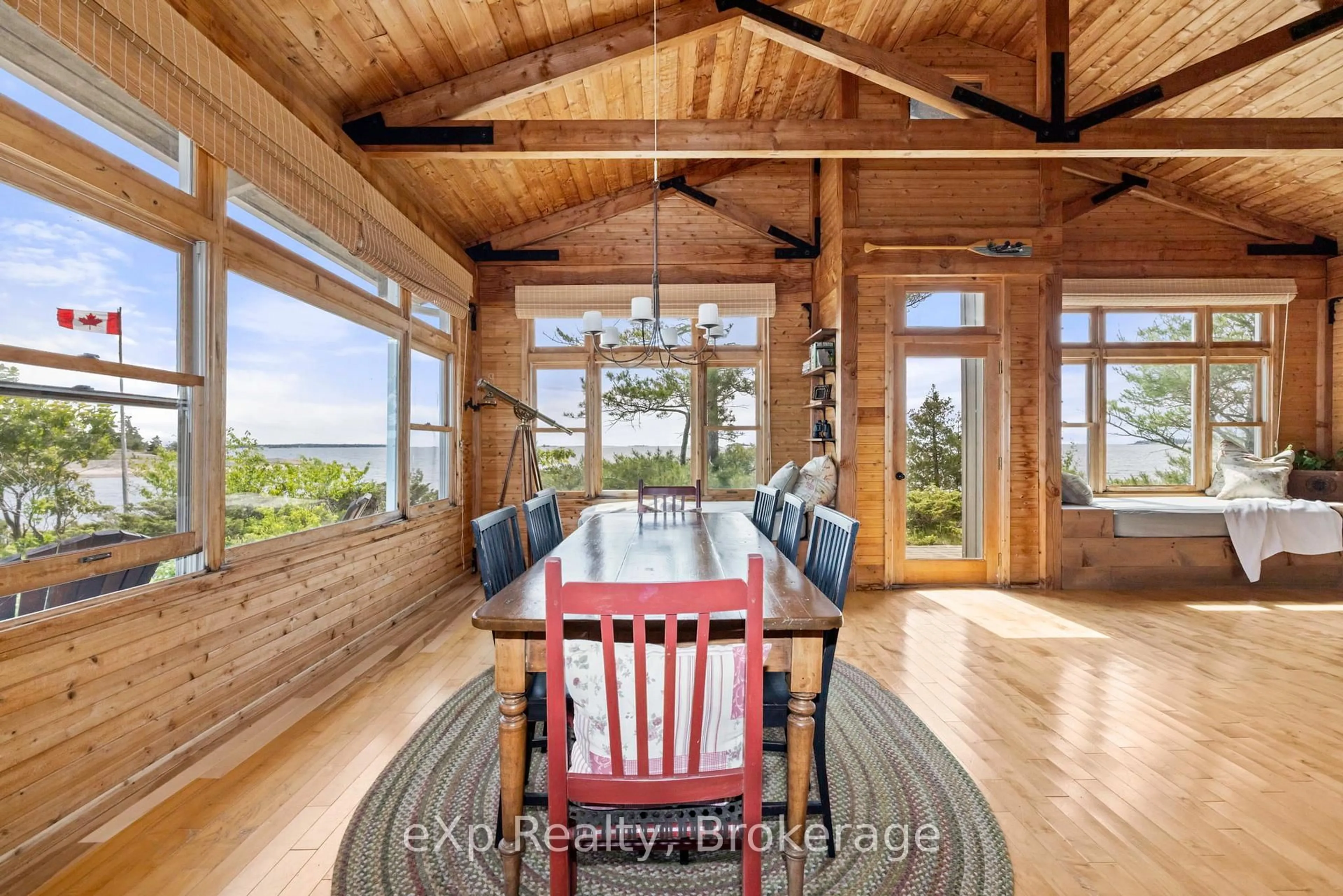 Dining room, wood/laminate floor for 1 Nebahwin Island, Carling Ontario P0G 1G0