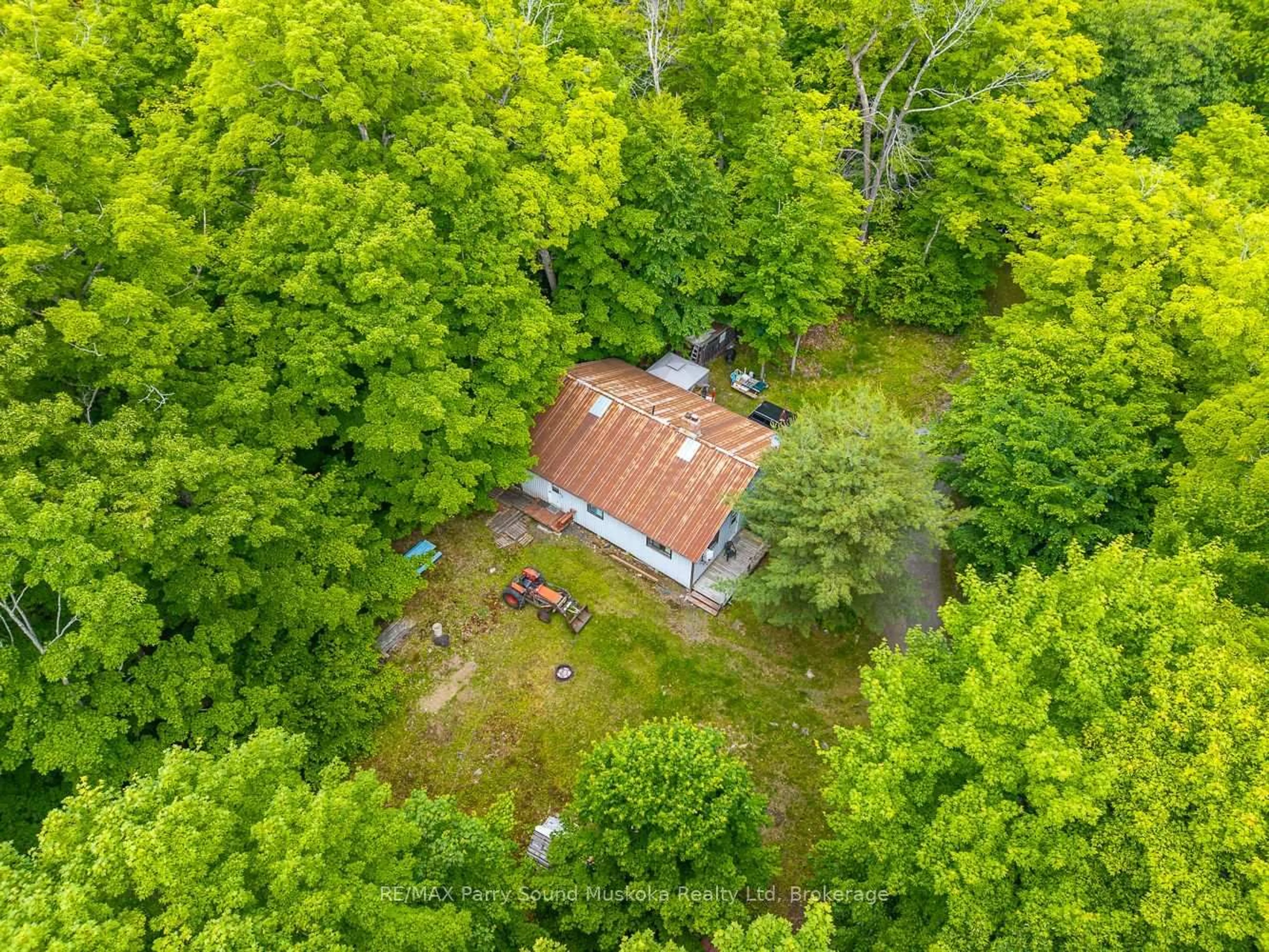 A pic from outside/outdoor area/front of a property/back of a property/a pic from drone, forest/trees view for 40 Loon Echo Tl Tr, Seguin Ontario P2A 2W8