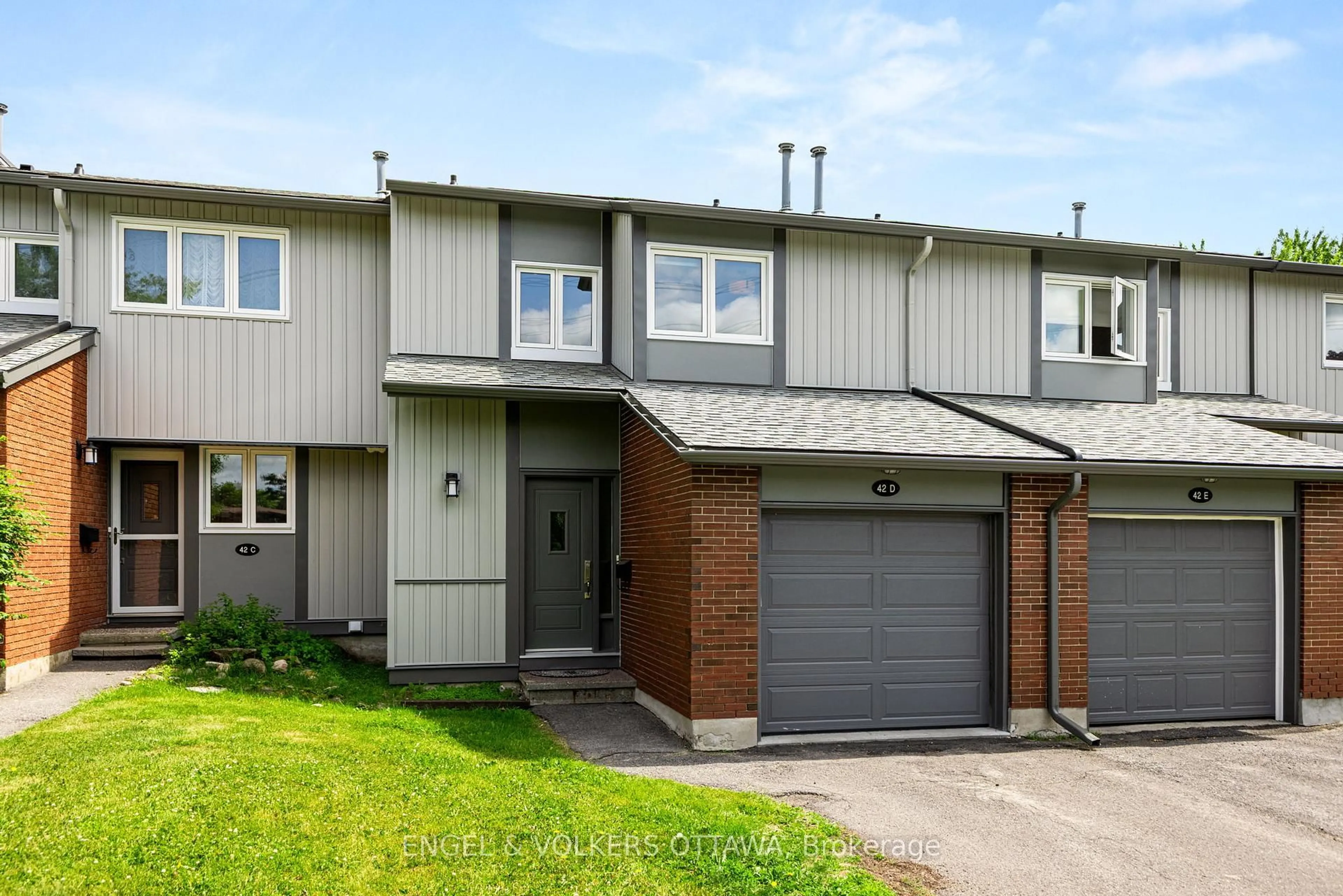 Home with vinyl exterior material, street for 42D Benlea Dr, Ottawa Ontario K2G 4A9