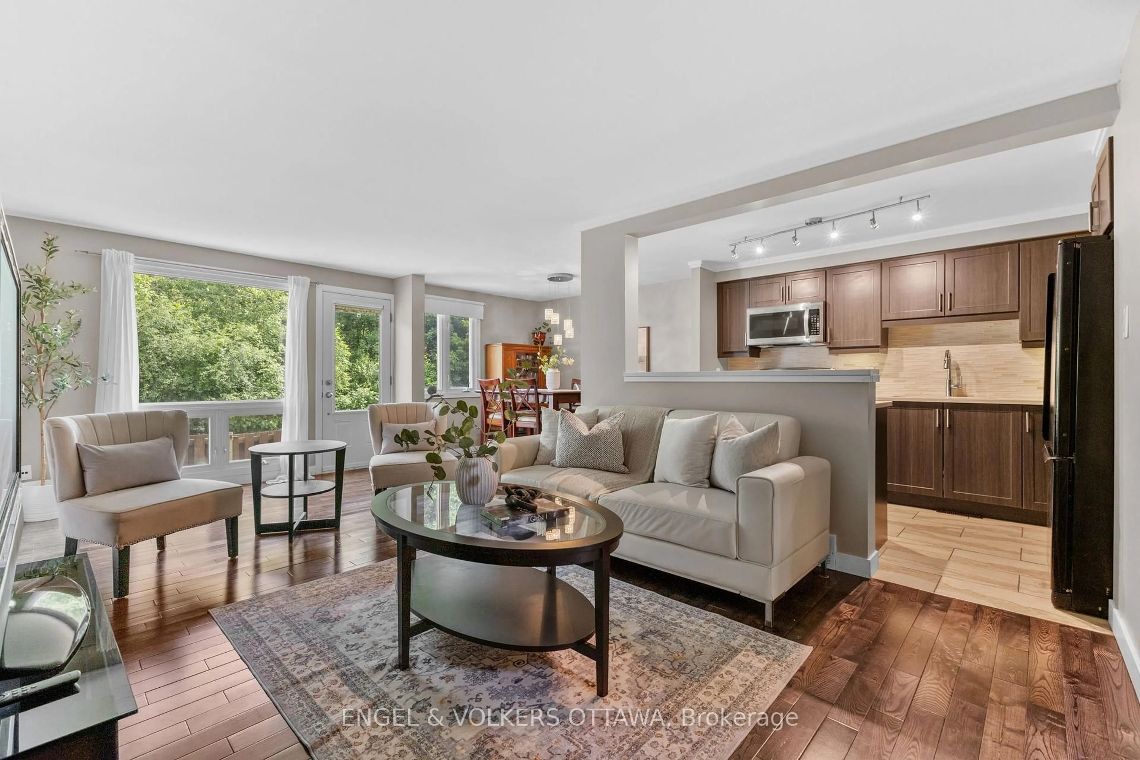 Living room with furniture, unknown for 42D Benlea Dr, Ottawa Ontario K2G 4A9