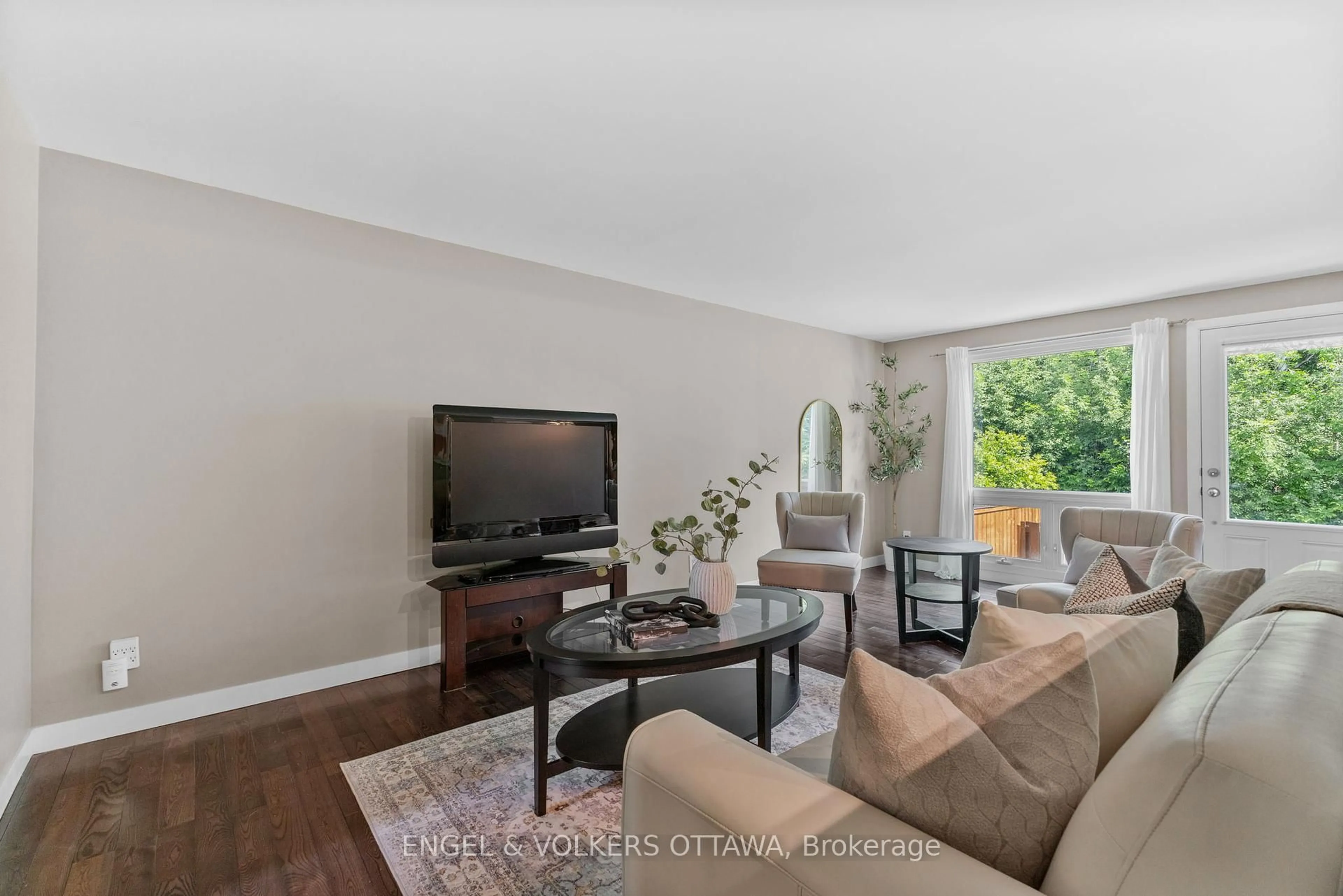 Living room with furniture, unknown for 42D Benlea Dr, Ottawa Ontario K2G 4A9