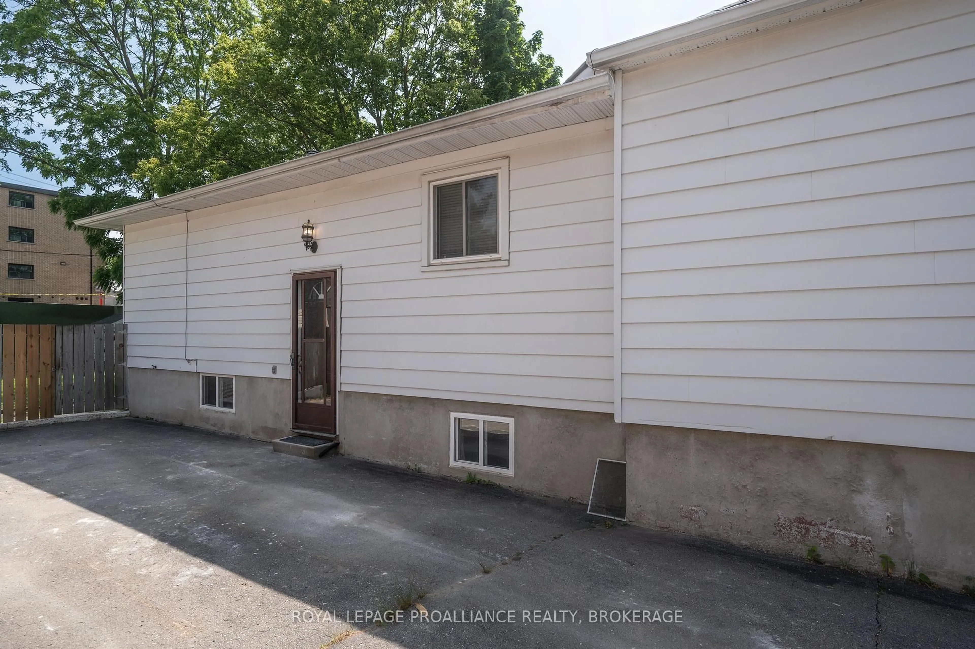 Home with vinyl exterior material, street for 58 Joseph St, Kingston Ontario K7K 2H5