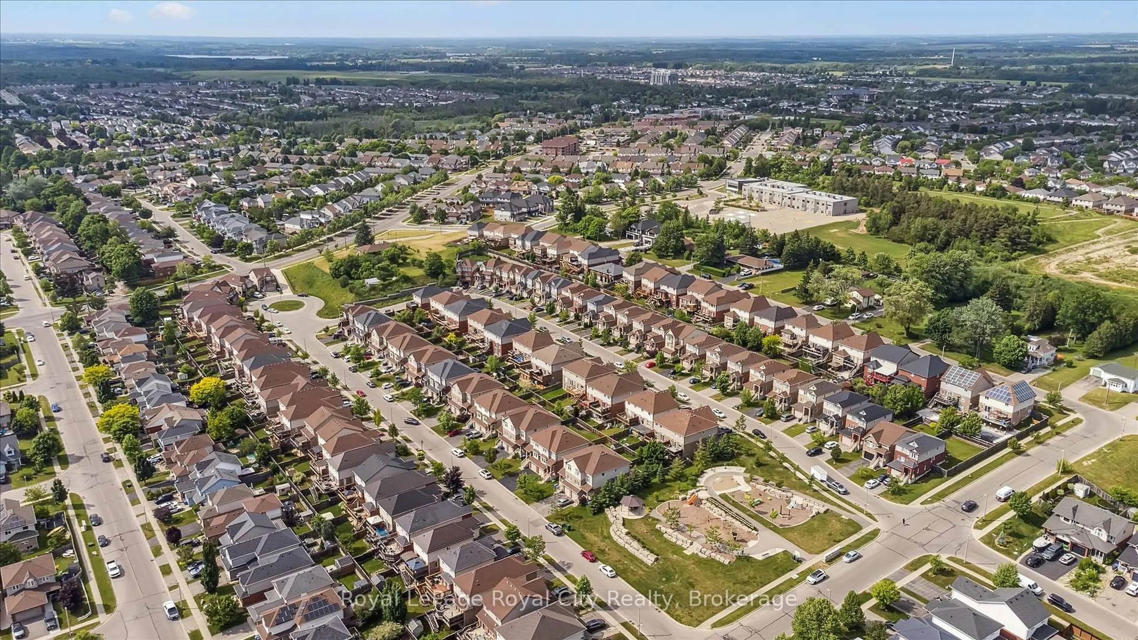 A pic from outside/outdoor area/front of a property/back of a property/a pic from drone, street for 31 Oakes Cres, Guelph Ontario N1E 0J6