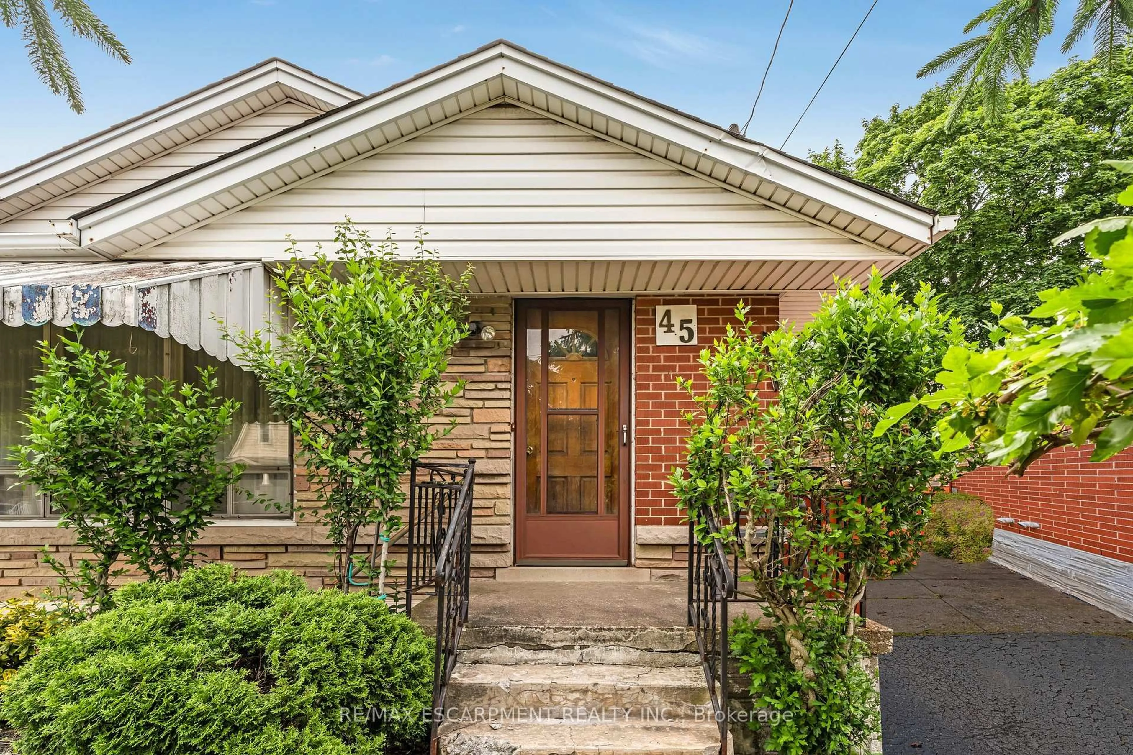 Home with brick exterior material, street for 45 East 17th St, Hamilton Ontario L9A 4L9