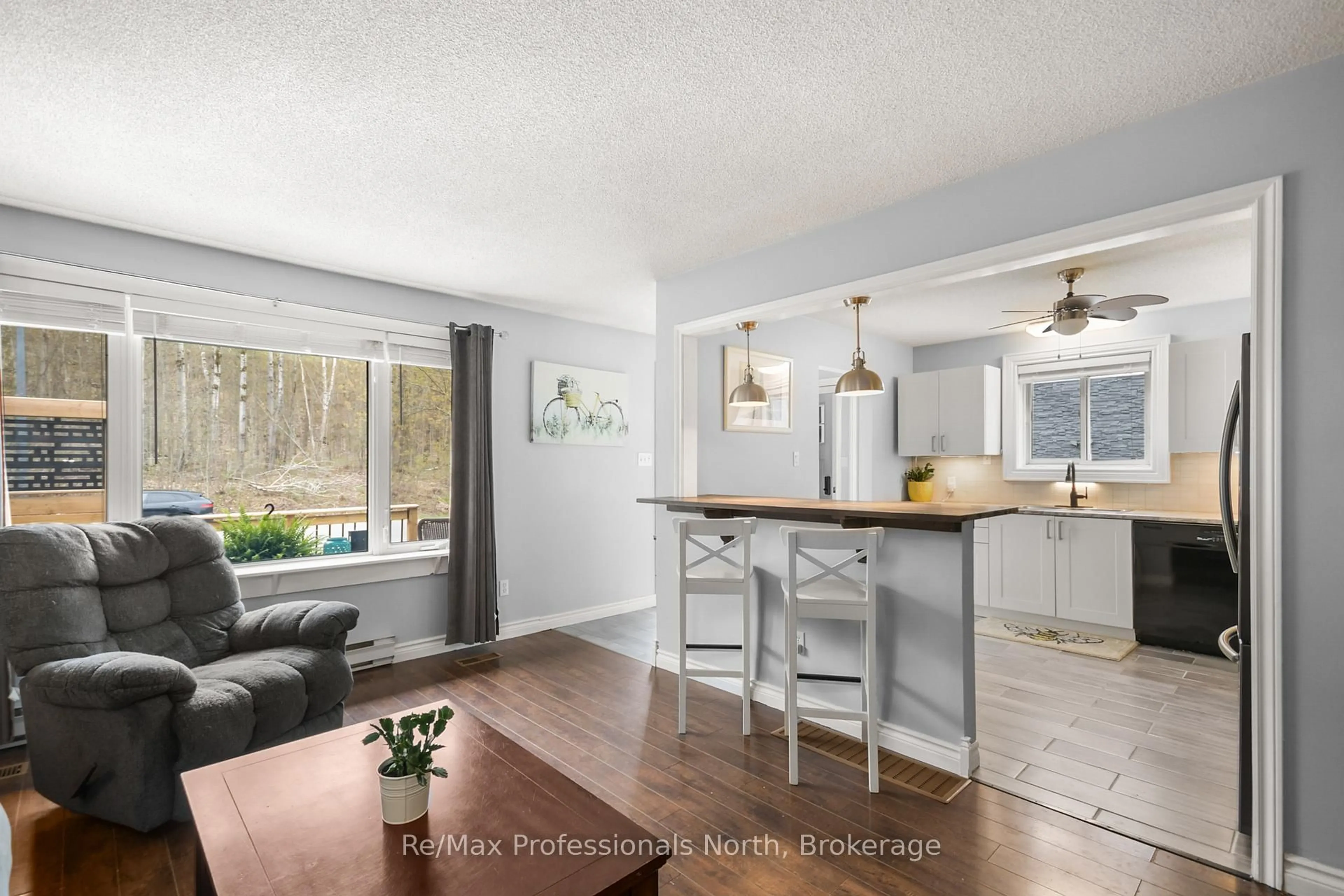 Open concept kitchen, wood/laminate floor for 180 FERNWOOD Dr, Gravenhurst Ontario P1P 1P4