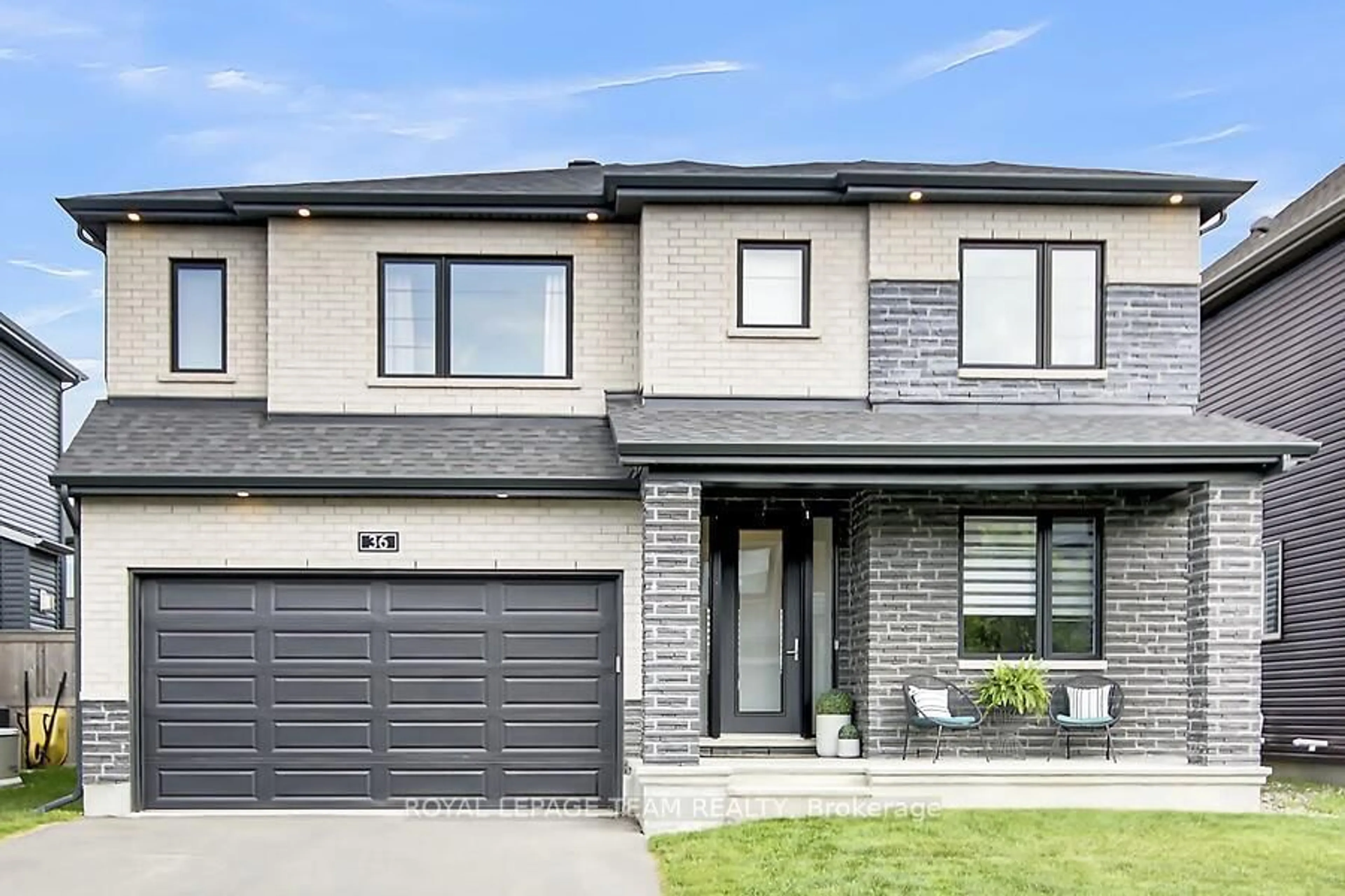 Home with brick exterior material, street for 36 Conch Way, Manotick Ontario K4M 0M4