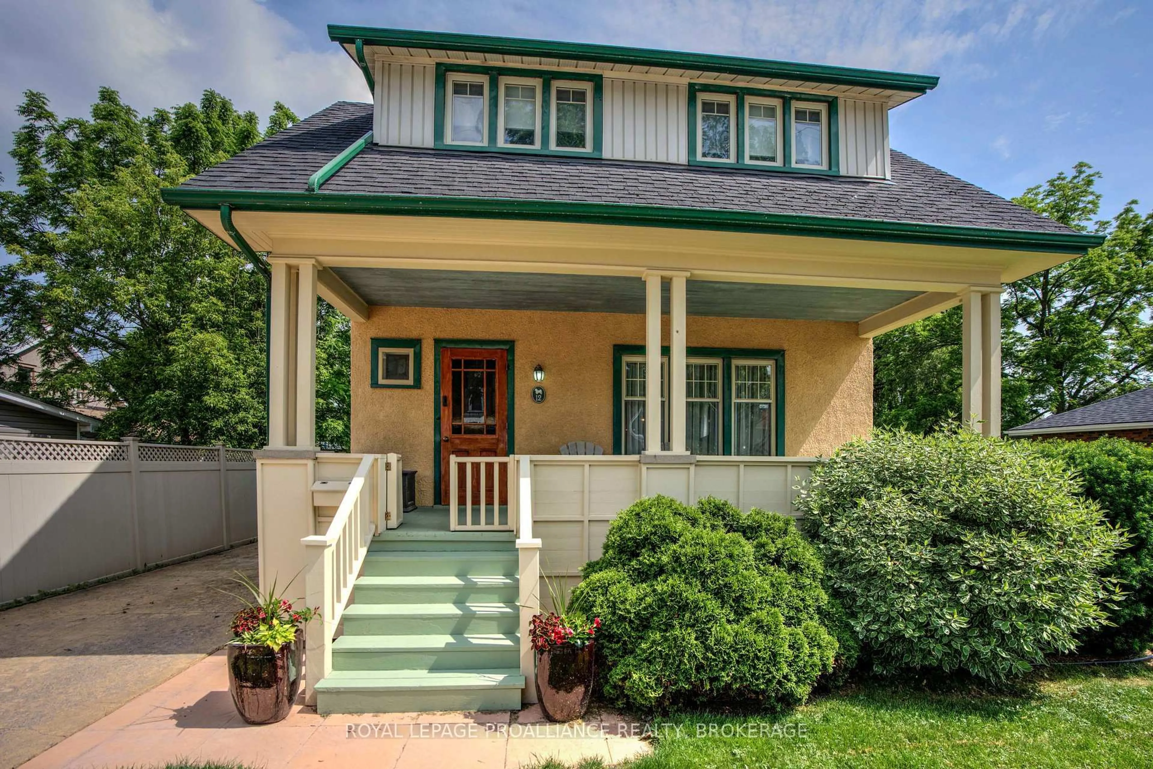 Home with vinyl exterior material, street for 12 Thomas St, Greater Napanee Ontario K7R 2G7