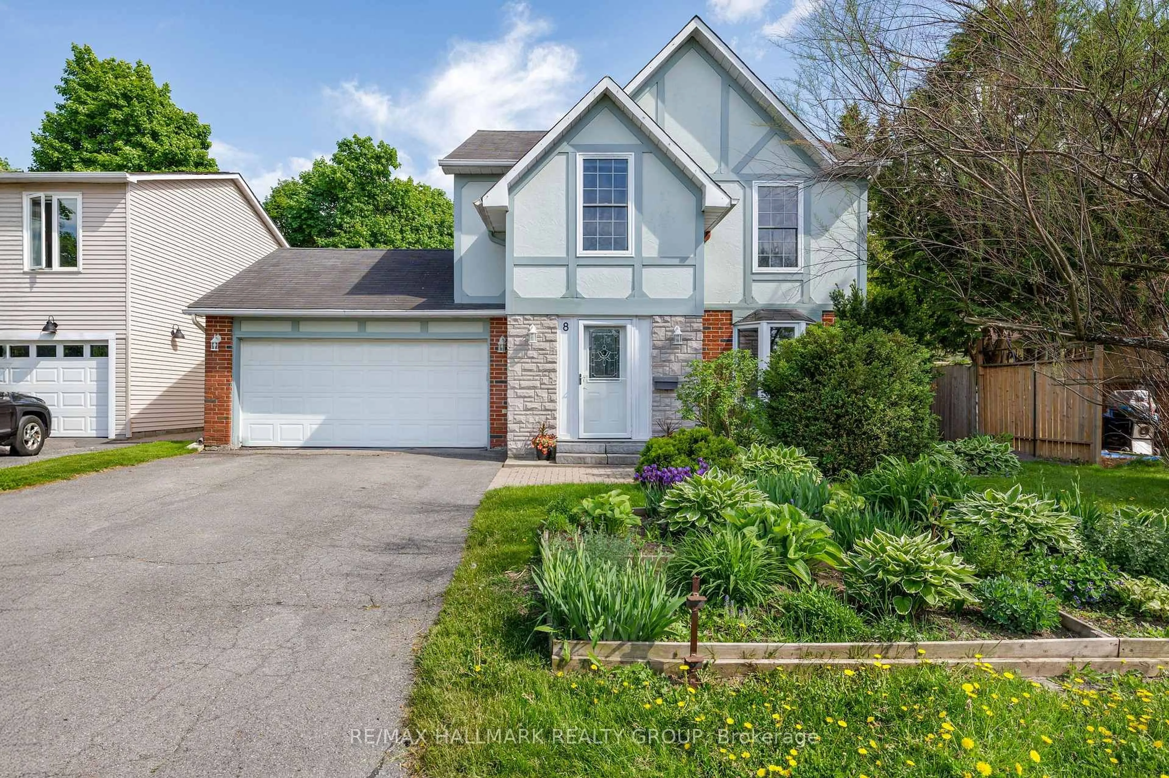 Home with vinyl exterior material, street for 8 Scharf Lane, Kanata Ontario K2L 2K2
