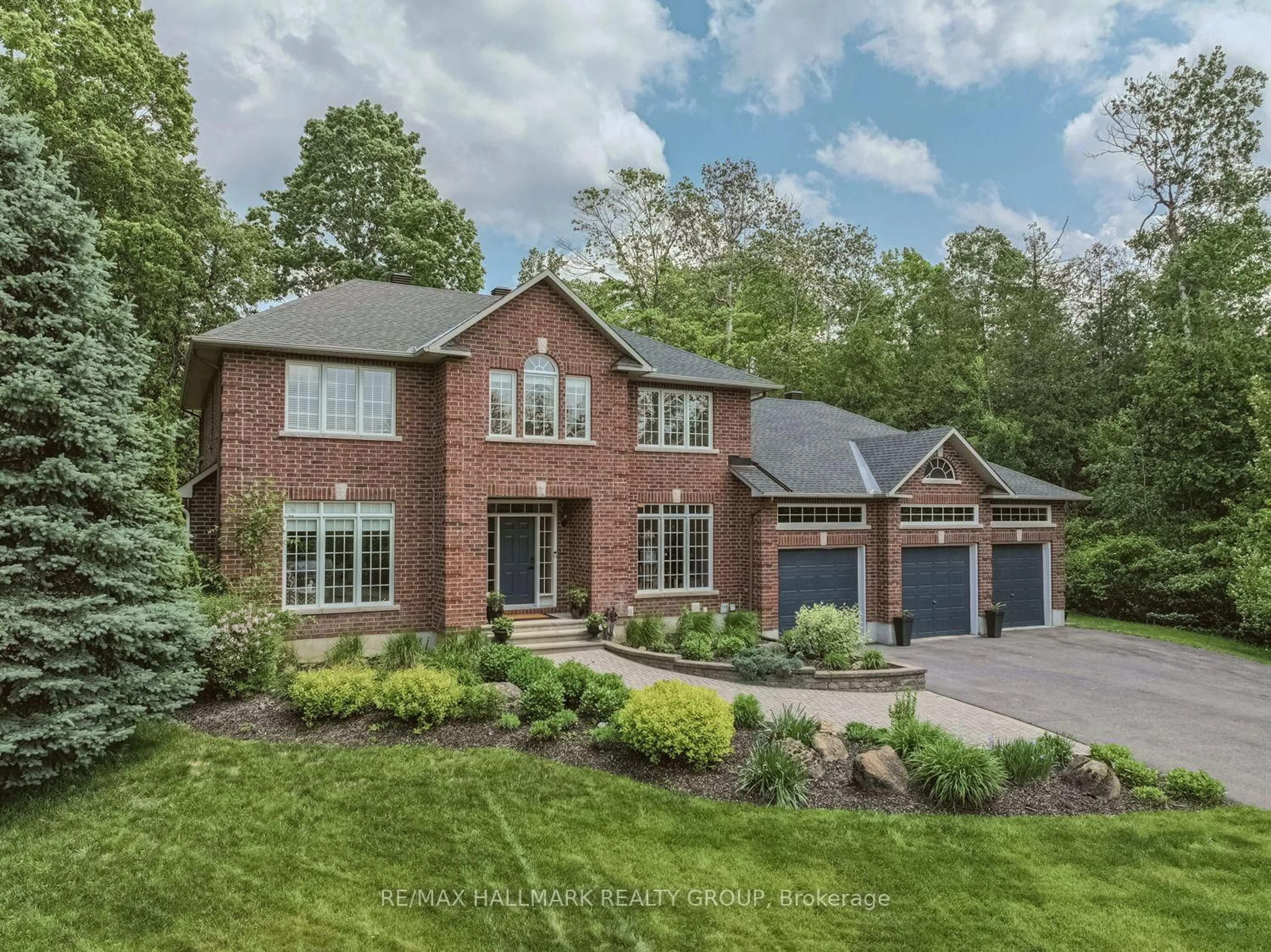 Home with brick exterior material, street for 1431 Duchess Cres, Ottawa Ontario K4M 1K2