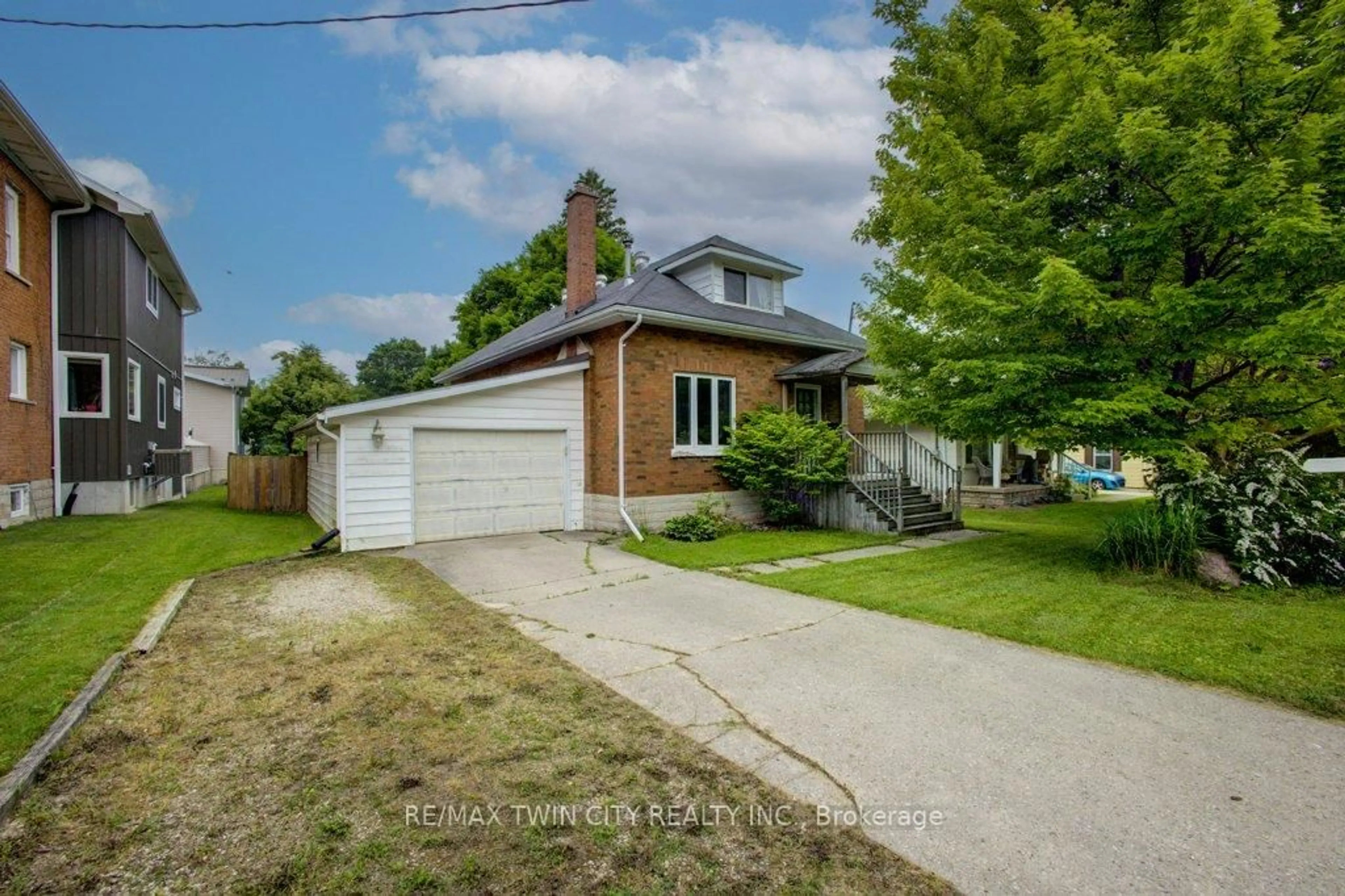 A pic from outside/outdoor area/front of a property/back of a property/a pic from drone, street for 480 ELMA St, North Perth Ontario N4W 2E7