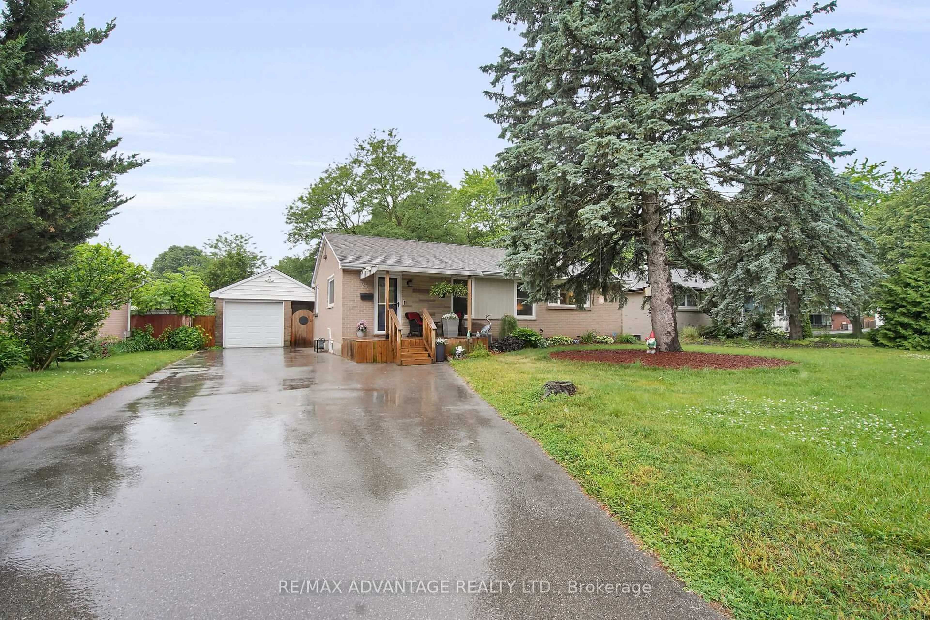 A pic from outside/outdoor area/front of a property/back of a property/a pic from drone, water/lake/river/ocean view for 25 Langton Rd, London East Ontario N5V 2L9