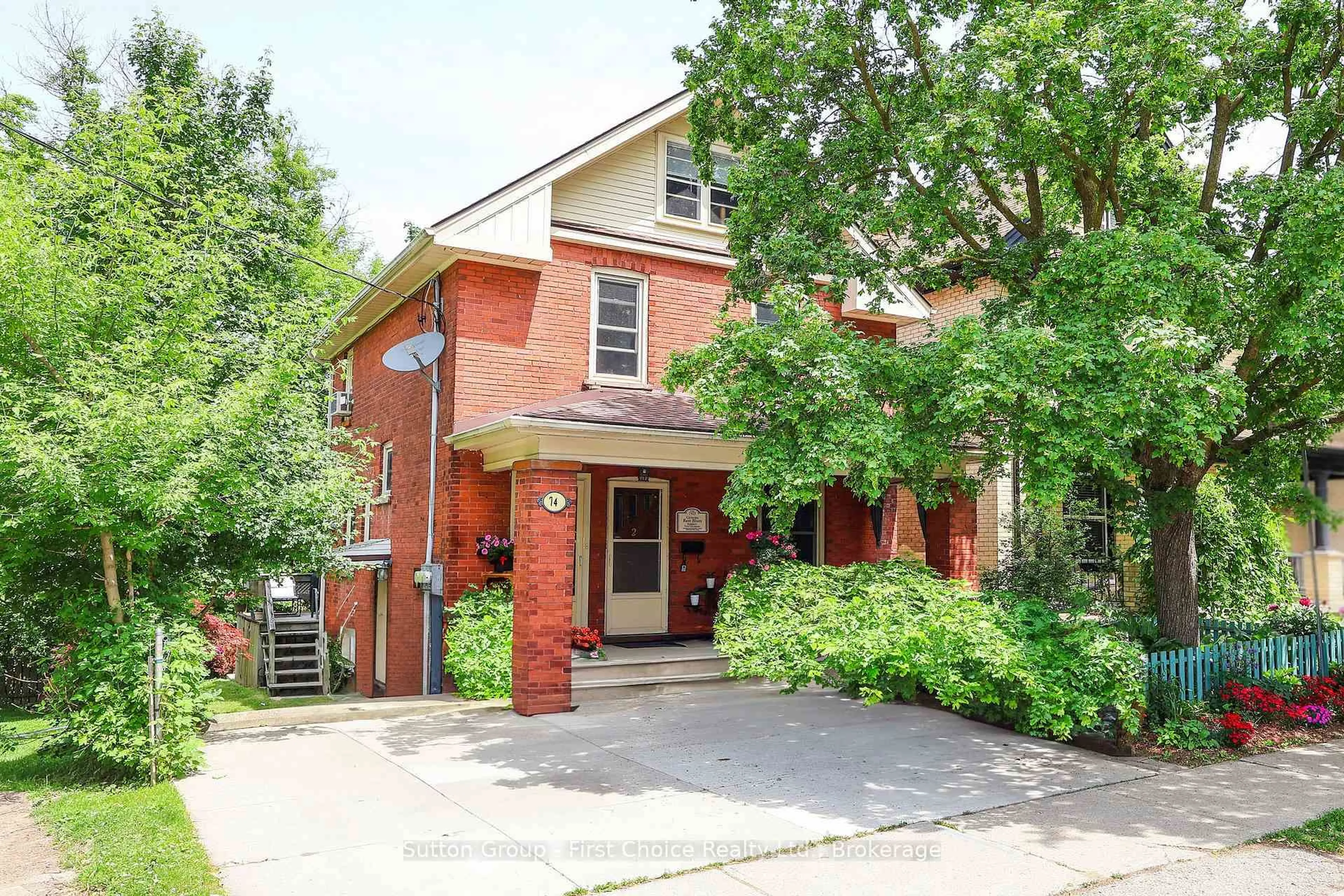 Home with brick exterior material, street for 74 Cobourg St, Stratford Ontario N5A 3E6
