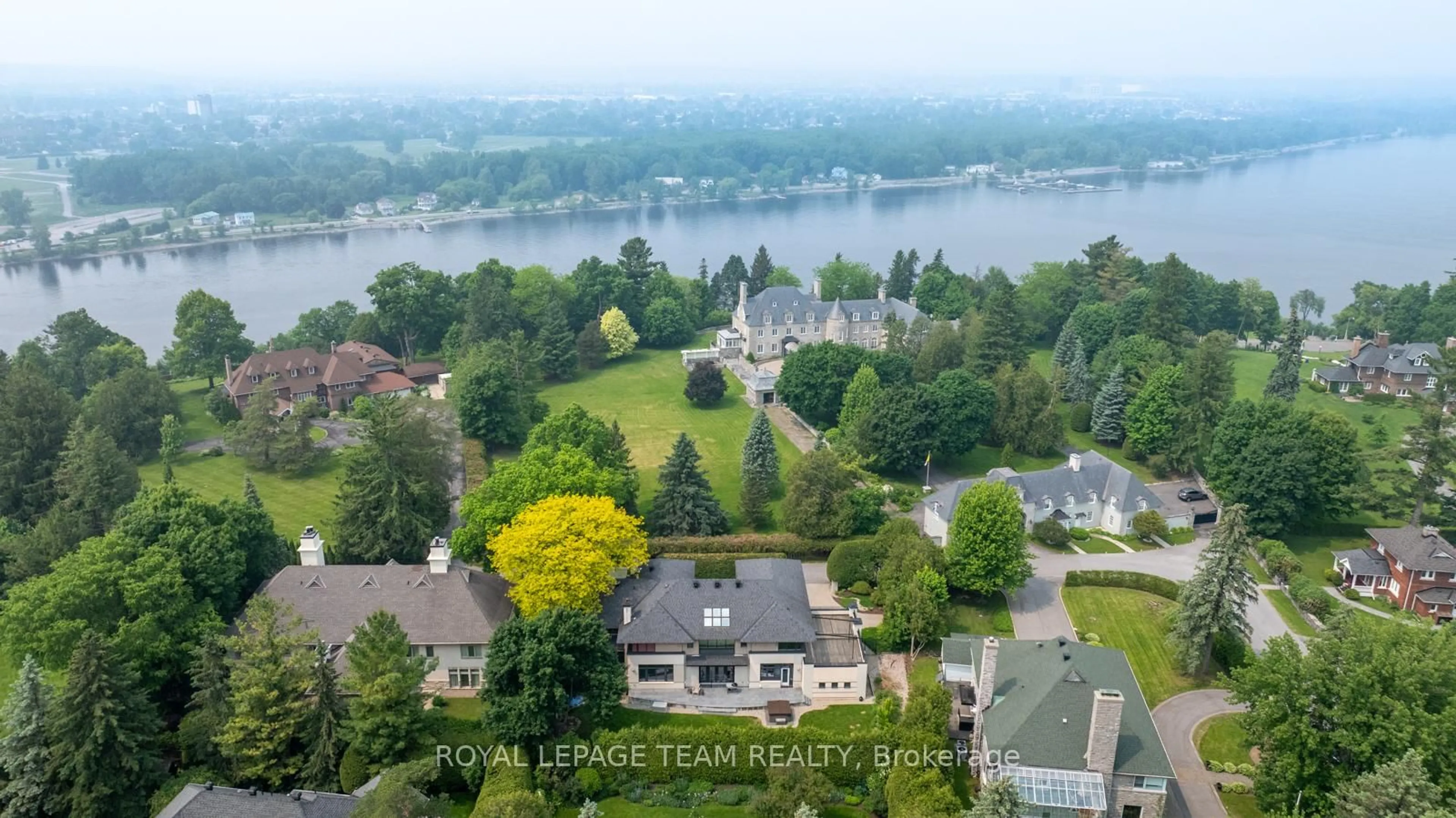 A pic from outside/outdoor area/front of a property/back of a property/a pic from drone, water/lake/river/ocean view for 725 Manor Ave, Ottawa Ontario K1M 0E4