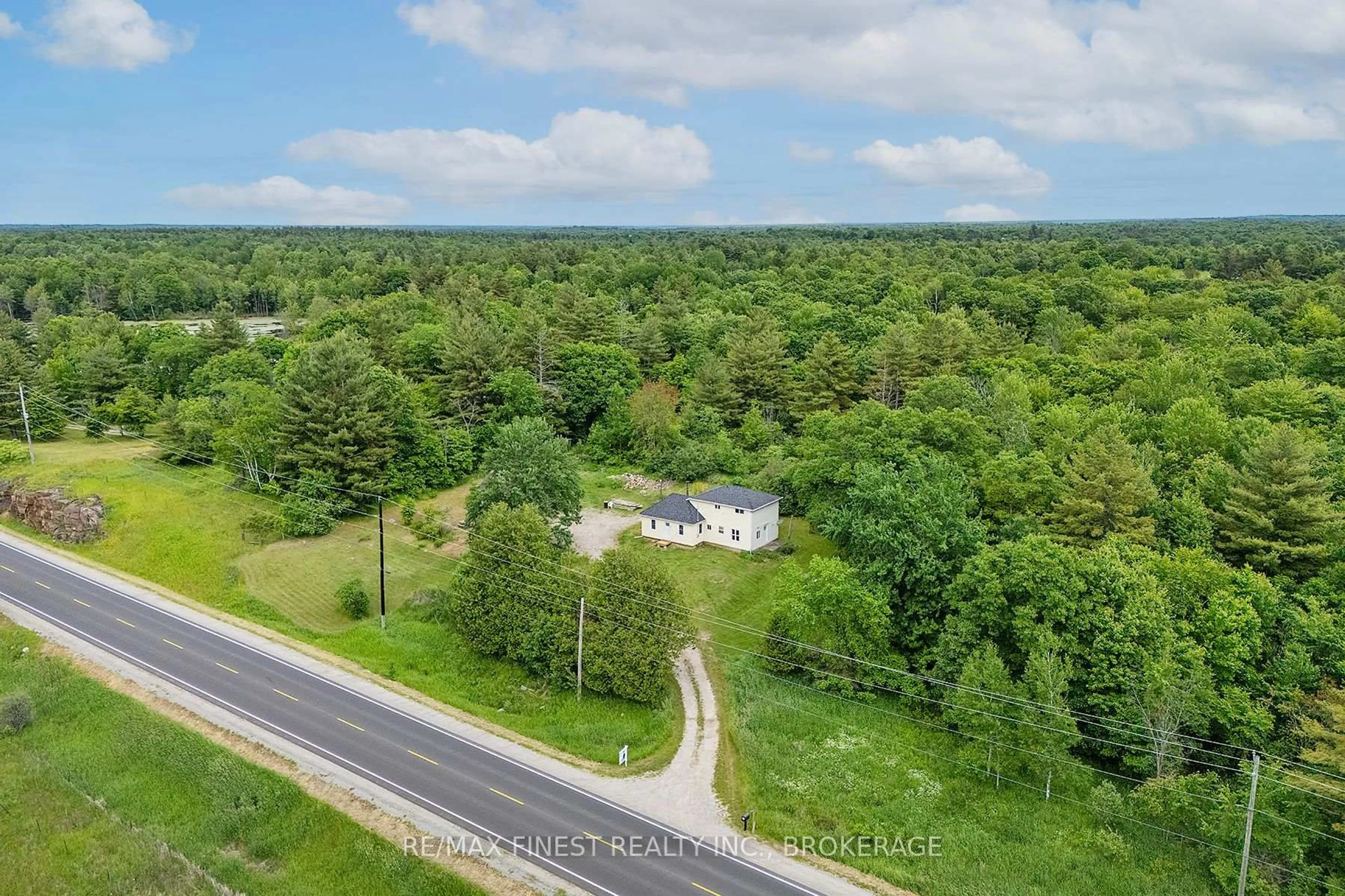 A pic from outside/outdoor area/front of a property/back of a property/a pic from drone, forest/trees view for 9678 Highway 38, Godfrey Ontario K0H 1T0