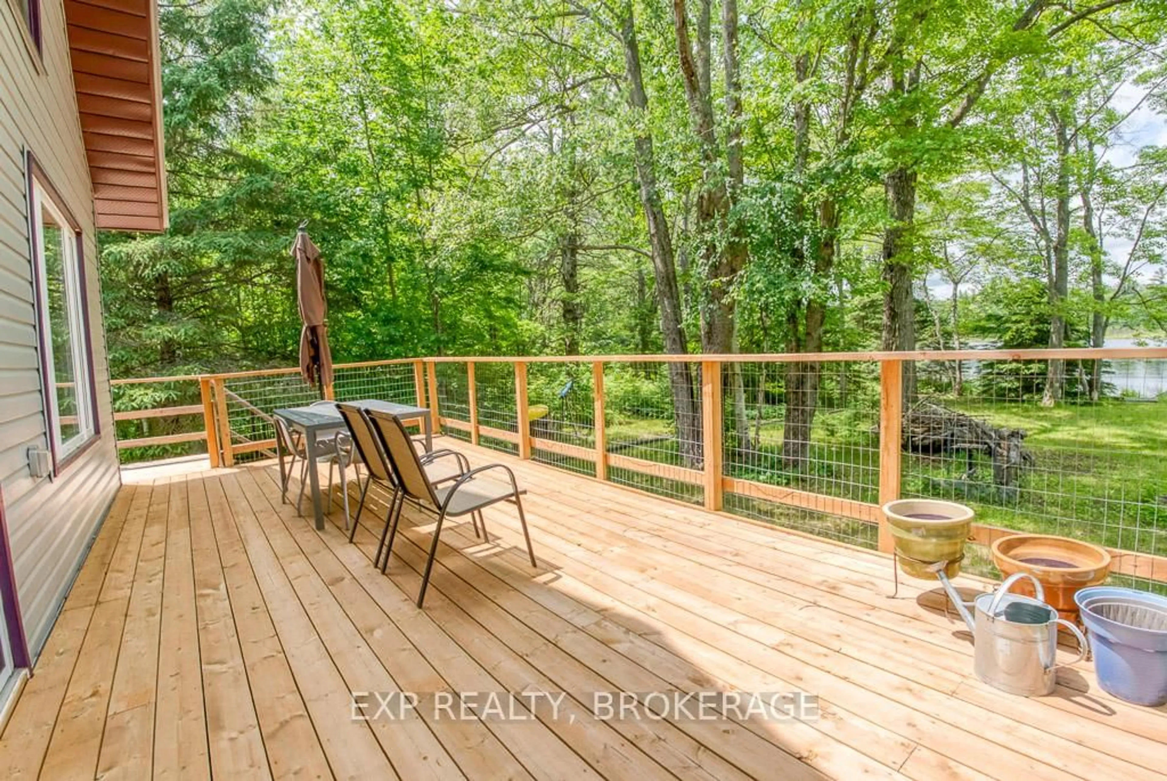 Patio, forest/trees view for 1305 Thunder Lane, Arden Ontario K0H 1B0
