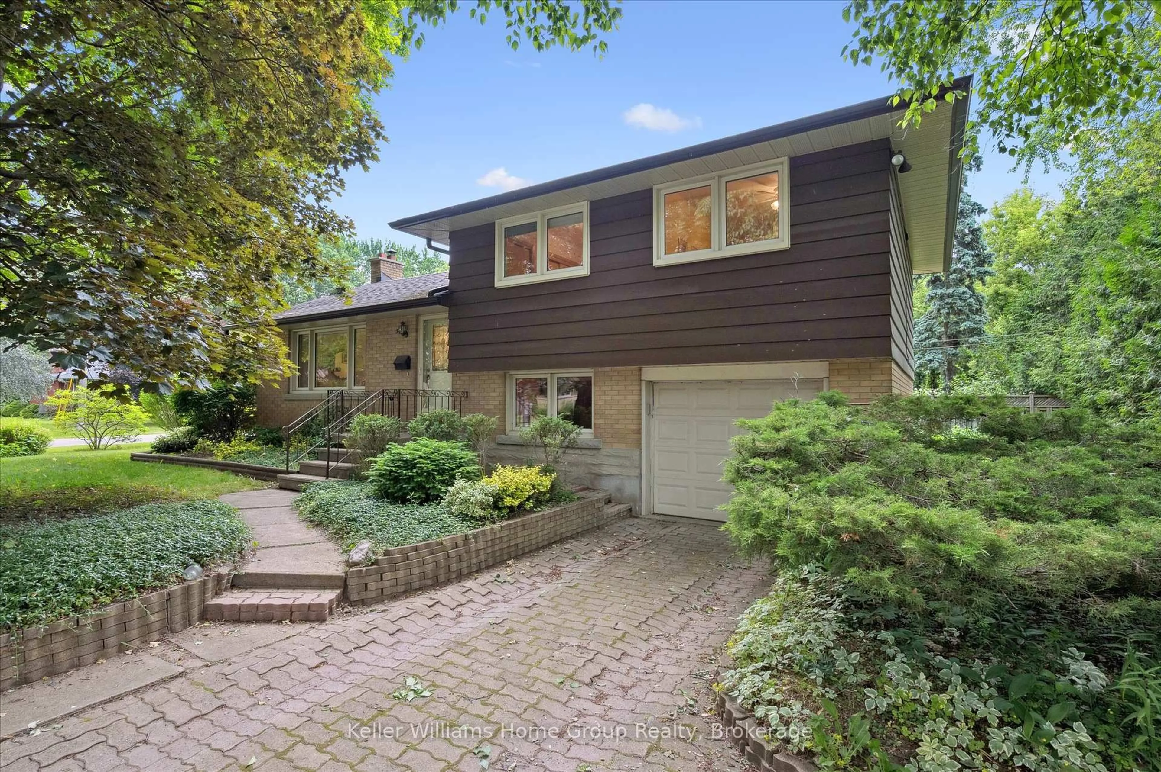 Home with brick exterior material, street for 34 Hales Cres, Guelph Ontario N1G 1P6