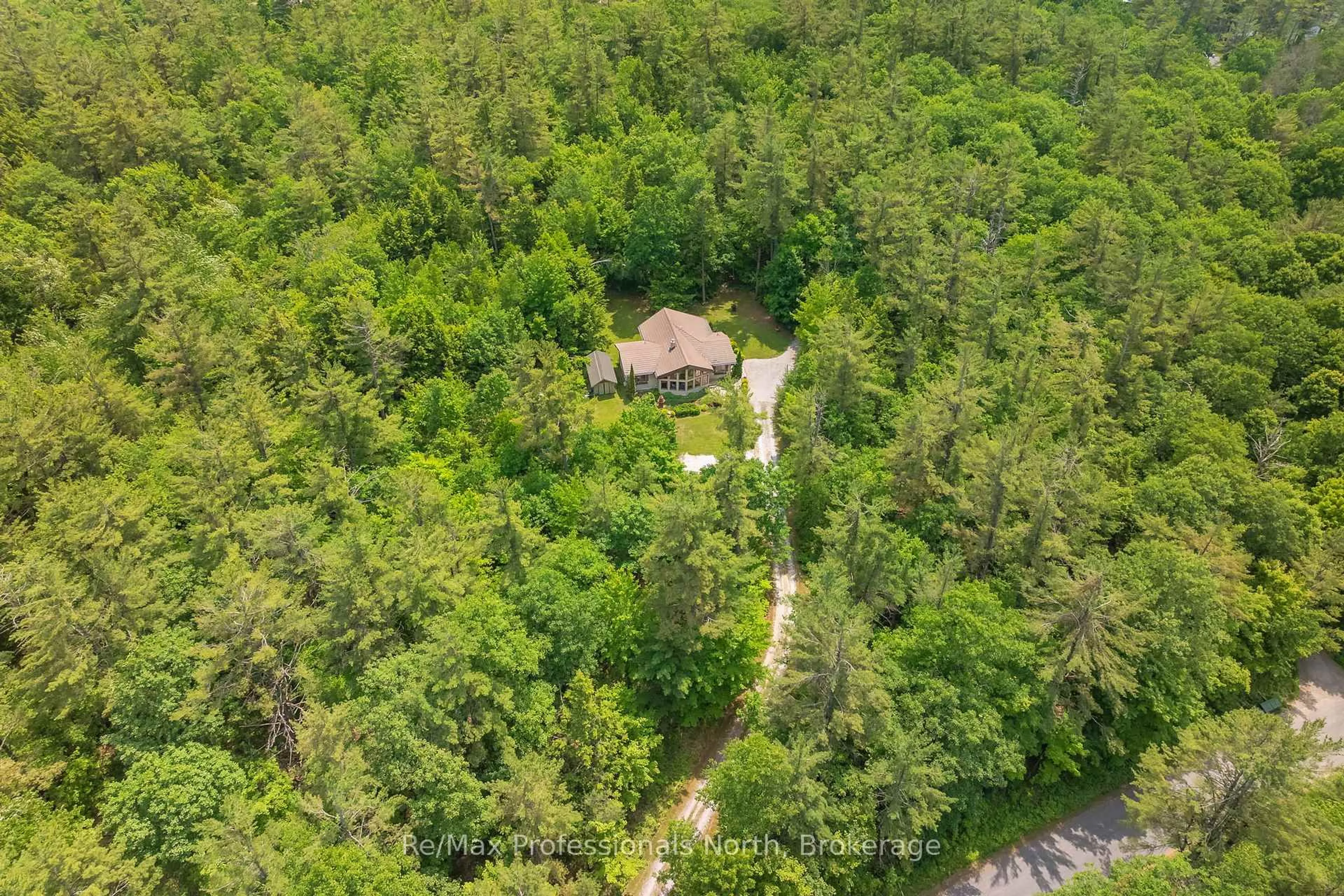 A pic from outside/outdoor area/front of a property/back of a property/a pic from drone, forest/trees view for 1279 Graham Rd, Gravenhurst Ontario P0E 1N0