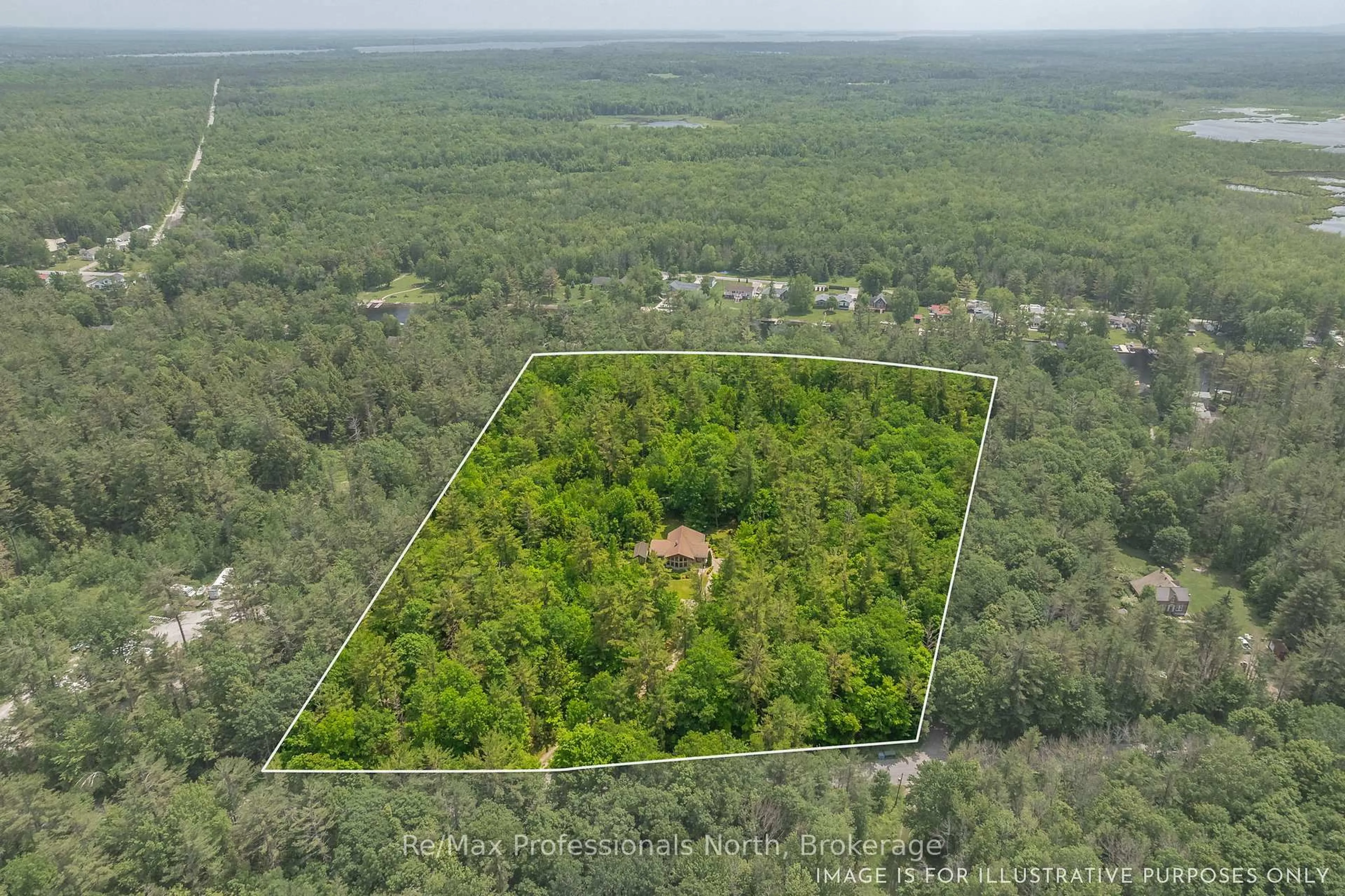 A pic from outside/outdoor area/front of a property/back of a property/a pic from drone, forest/trees view for 1279 Graham Rd, Gravenhurst Ontario P0E 1N0