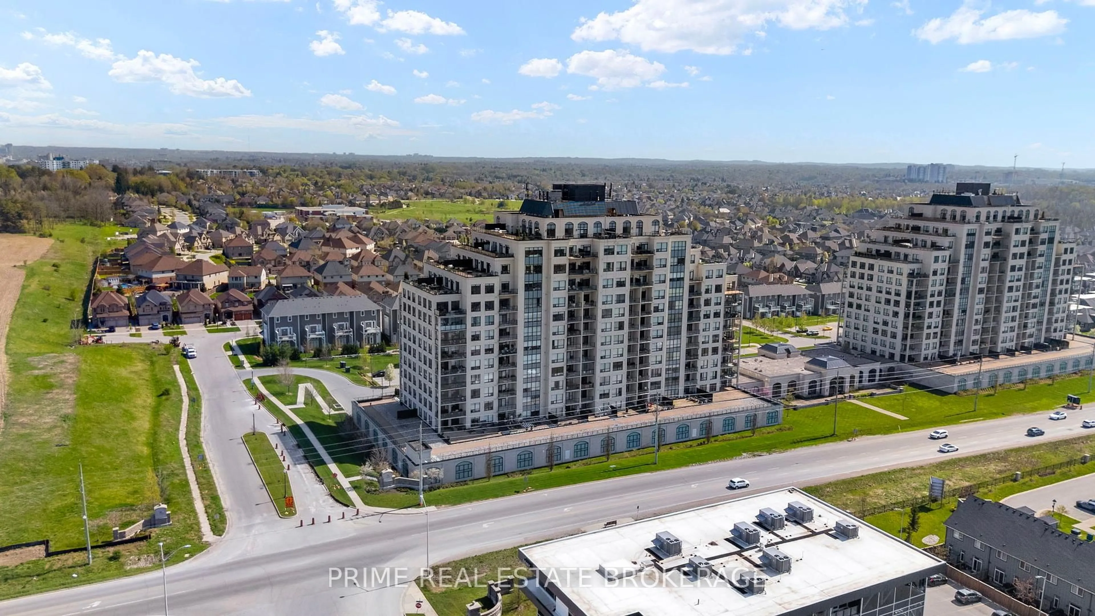 A pic from outside/outdoor area/front of a property/back of a property/a pic from drone, city buildings view from balcony for 240 Village Walk Blvd #514, London North Ontario N6G 0P6